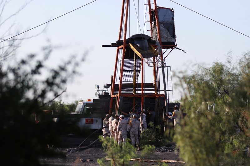 Soldiers stand next to a coal mine shaft that collapsed, trapping miners, in Sabinas, Coahuila state, Mexico.  August 4, 2022. REUTERS/Antonio Ojeda