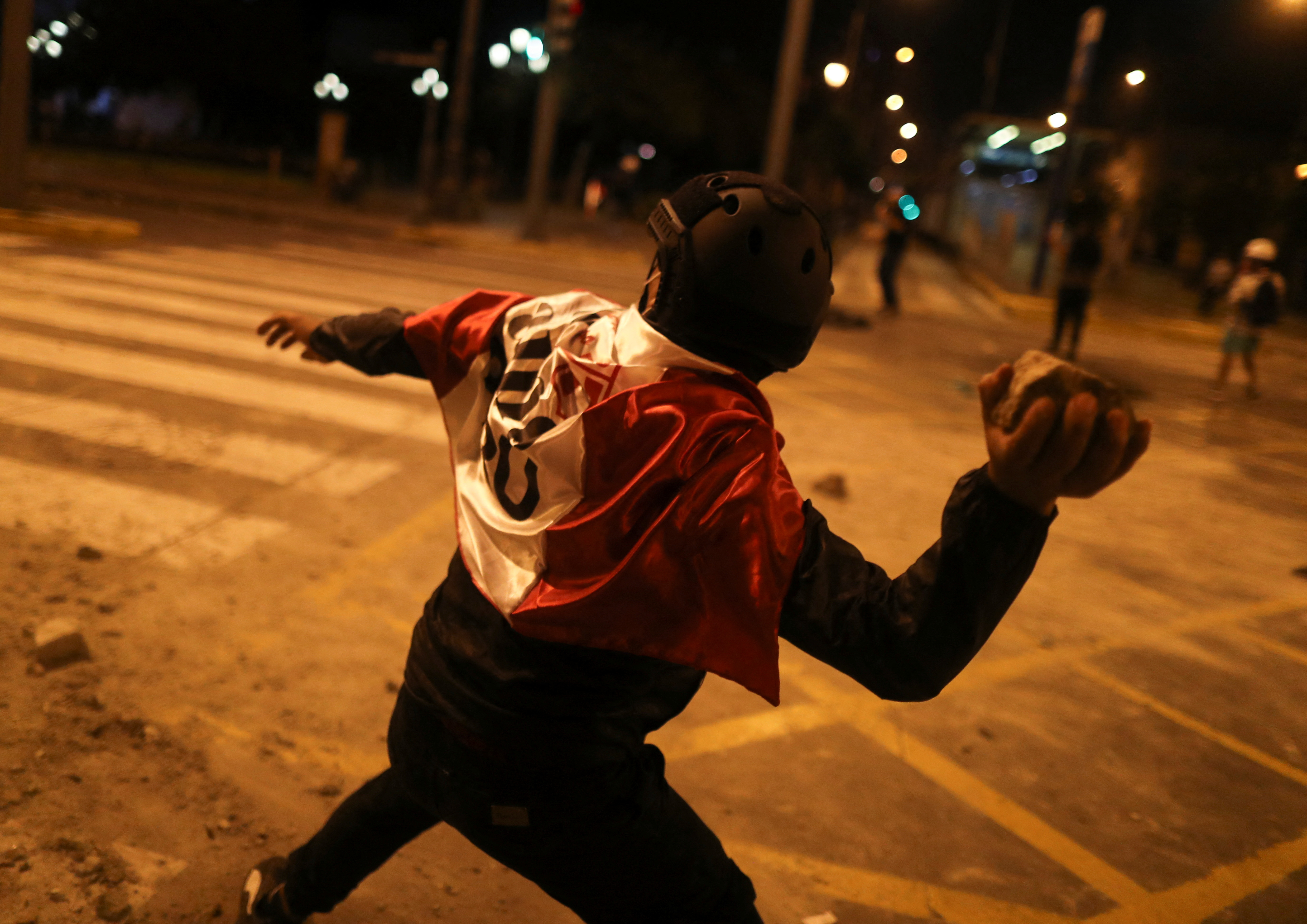 Demonstrators protest demanding the dissolution of Congress and to hold democratic elections rather than recognise Dina Boluarte as Peru's President, after the ousting of Peruvian President Pedro Castillo, in Lima, Peru December 12, 2022. REUTERS/Sebastian Castaneda