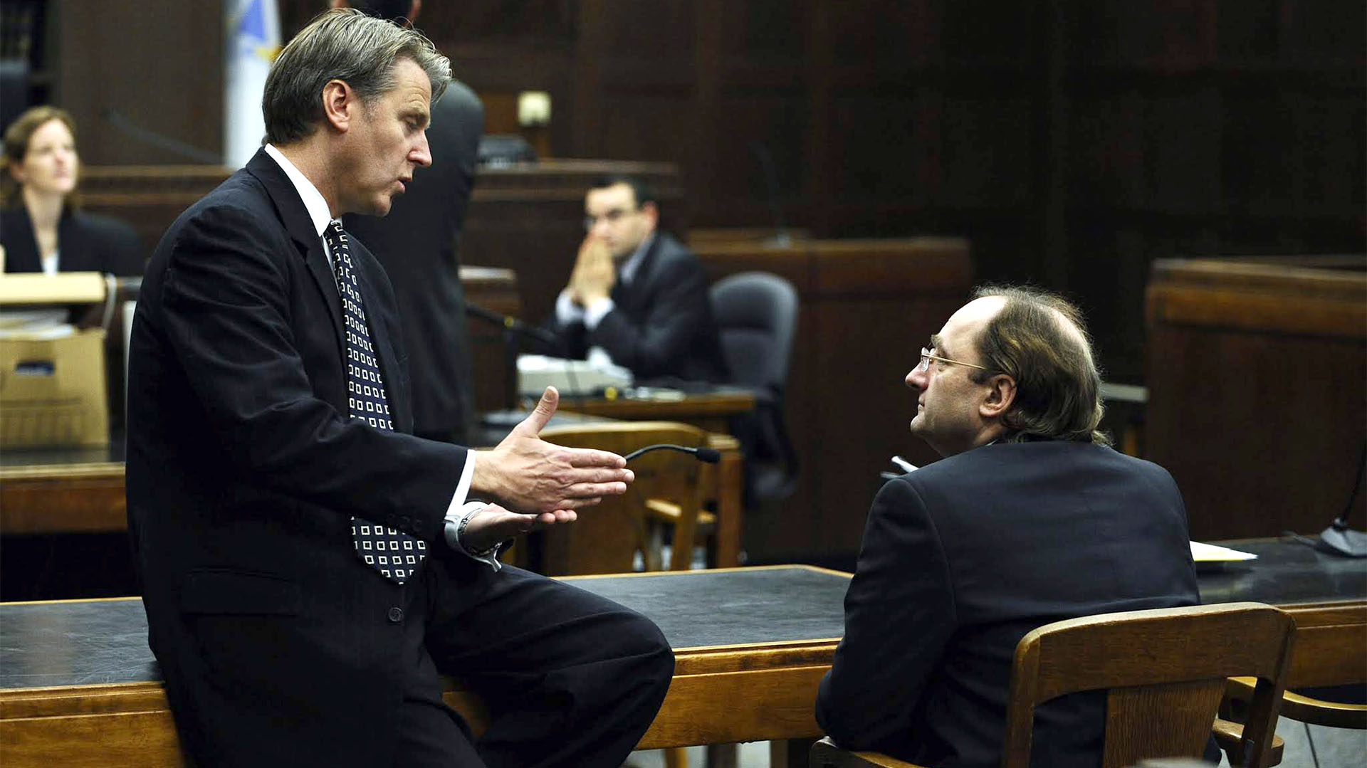 Christian Karl Gerhartsreiter escucha a su abogado defensor Timothy Bradl antes de una audiencia en Corte Superior de Suffolk, en Boston, por el secuestro de su hija de 7 años.