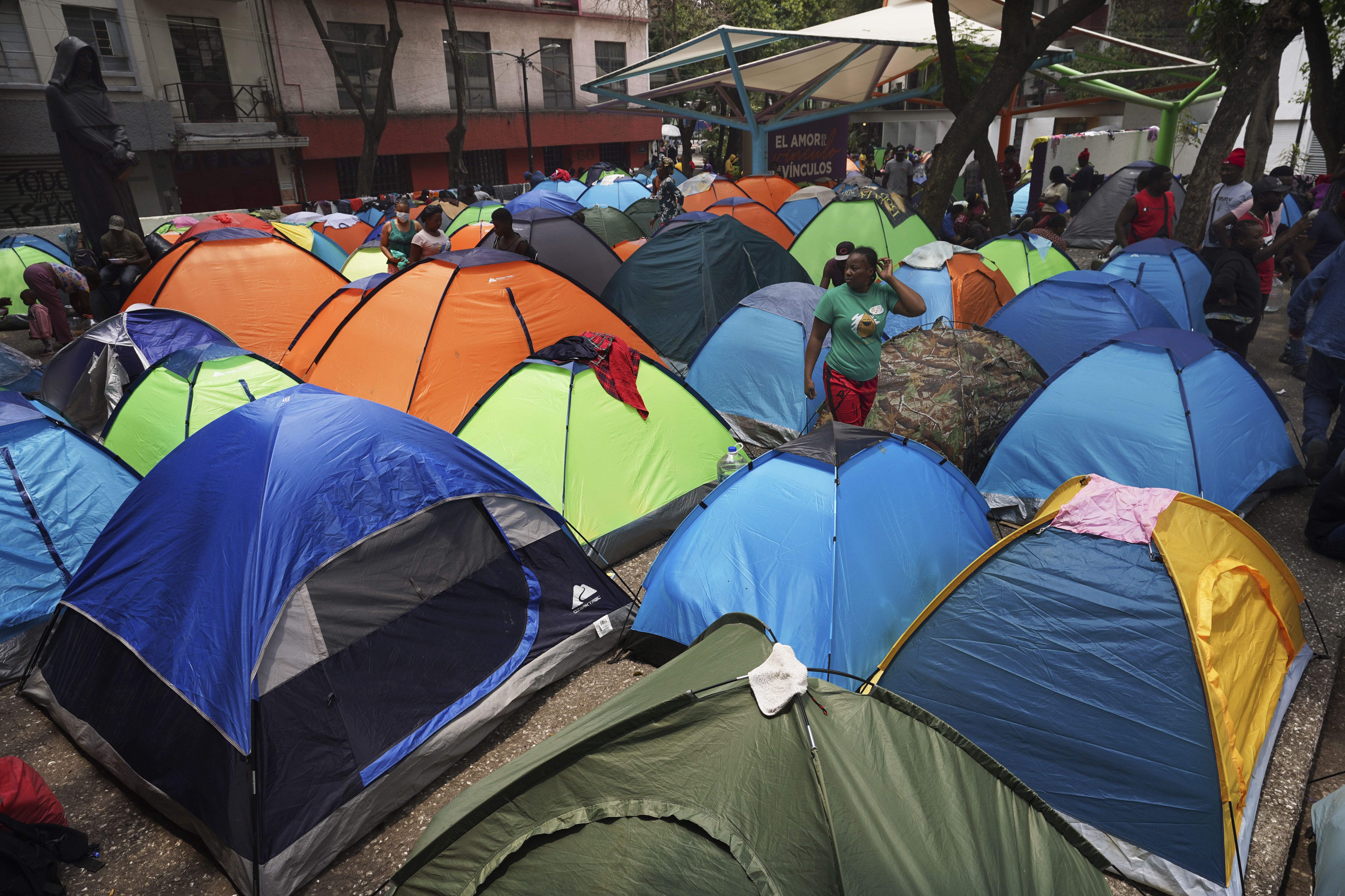 Haitian migrants camp outside Plaza Giordano Bruno, on May 18, 2023, in Mexico City.  (AP Photo/Marco Ugarte, File)