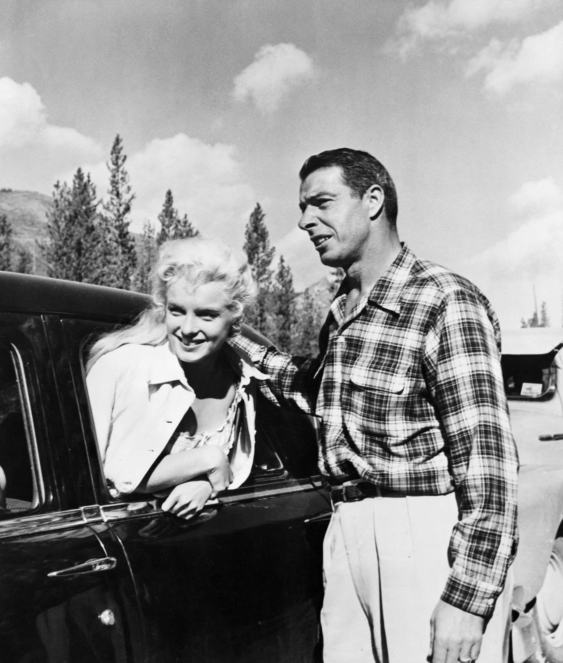 Joe DiMaggio visits Marilyn Monroe, on location in the Canadian wilderness, while filming River of No Return (Getty)