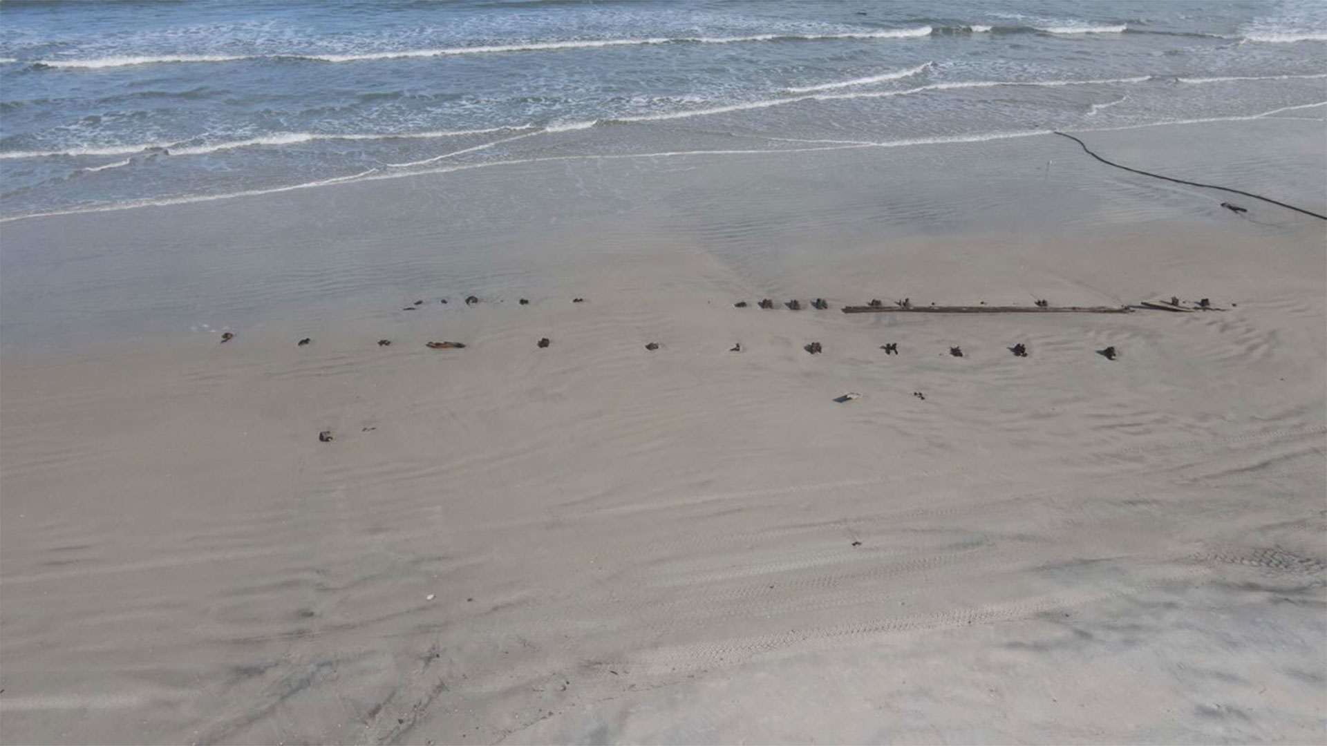 Algunas teorías señalan que se trata de una barrera, un naufragio, una parte de un antiguo muelle o asientos para los espectadores de cuando NASCAR tenía carreras en la playa (Volusia County)