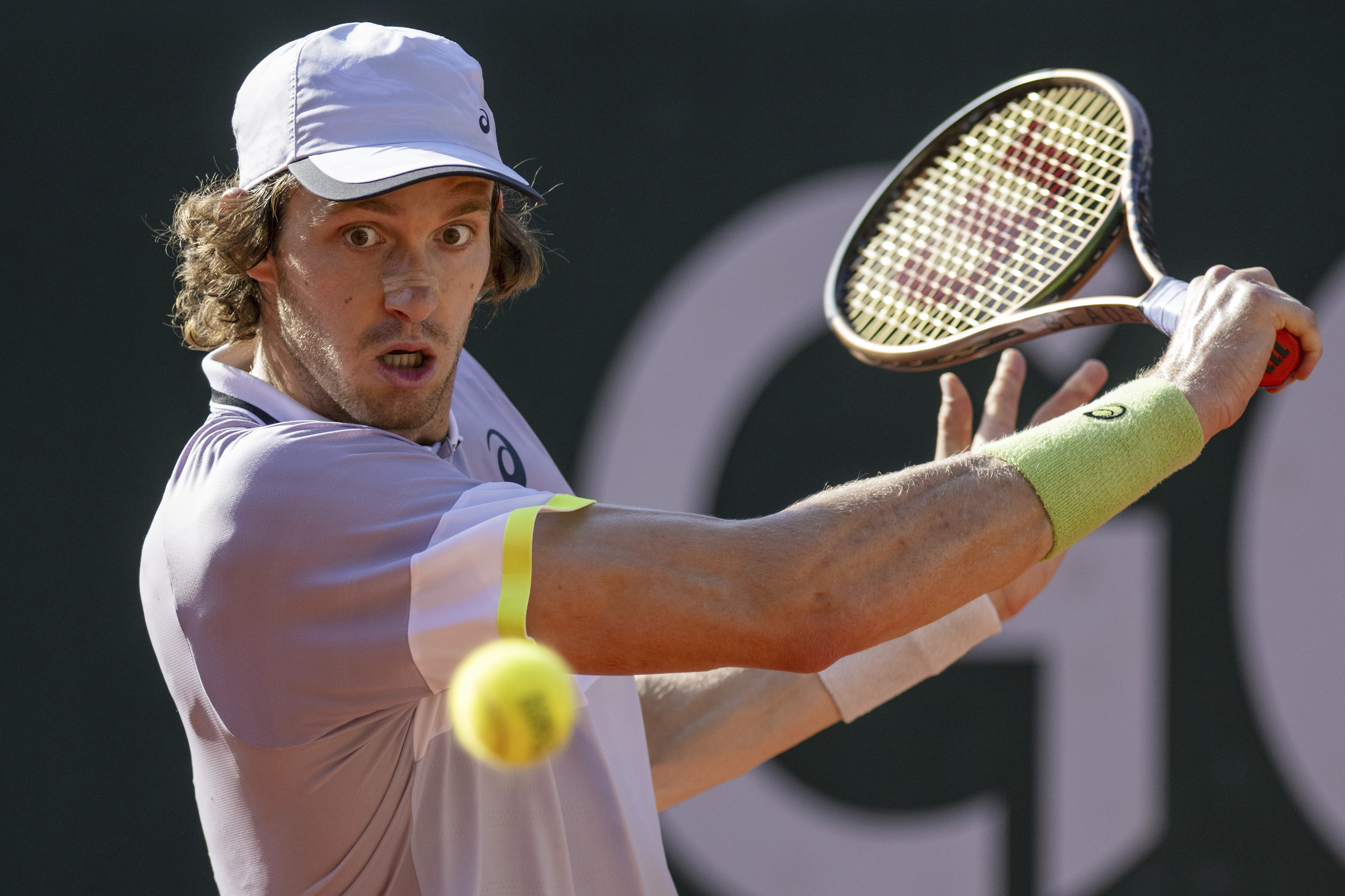 Nicolás Jarry of Chile returns a ball to Alexander Zverev of Germany in the semifinal of the Geneva Open on Friday, May 26, 2023. (Martial Trezzini/Keystone via AP)
