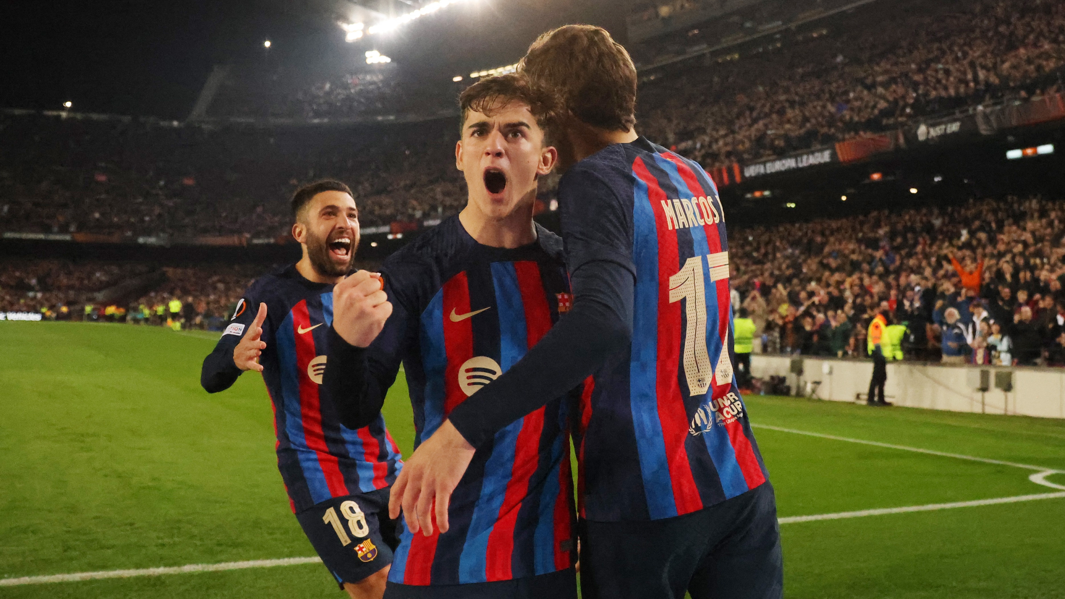 Soccer Football - Europa League - Play-Off First Leg - FC Barcelona v Manchester United - Camp Nou, Barcelona, Spain - February 16, 2023  FC Barcelona's Marcos Alonso celebrates scoring their first goal with teammates REUTERS/Nacho Doce