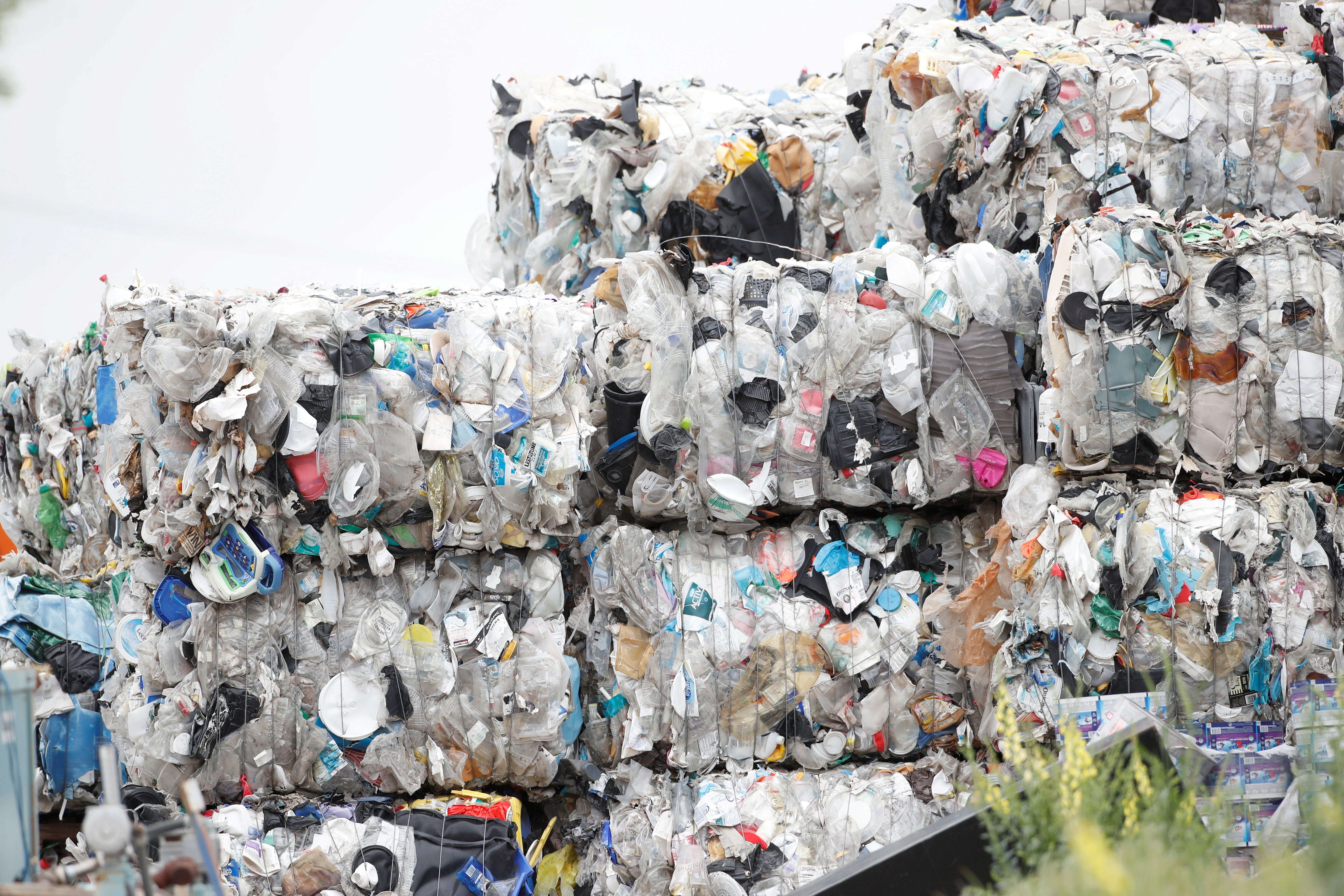 FILE PHOTO: Bales of hard-to-recycle plastic waste are seen piled up at Renewlogy Technologies in Salt Lake City, Utah, U.S., on May 17, 2021. REUTERS/George Frey/File Photo