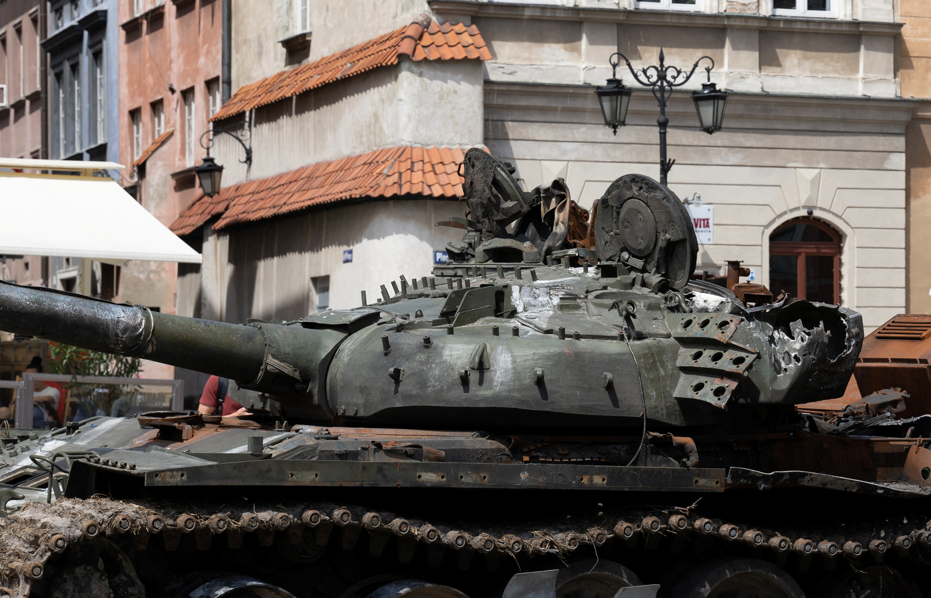 A destroyed Russian T-72B tank captured by the Ukrainian army is displayed during an exhibition called "For our freedom and yours" in the old town of Warsaw, Poland, June 27, 2022. REUTERS/Kacper Pempel