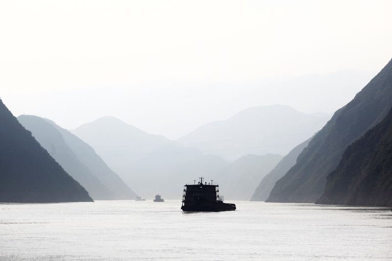 A boat sails down the Yangtze River near Badong, Hubei province (Reuters)