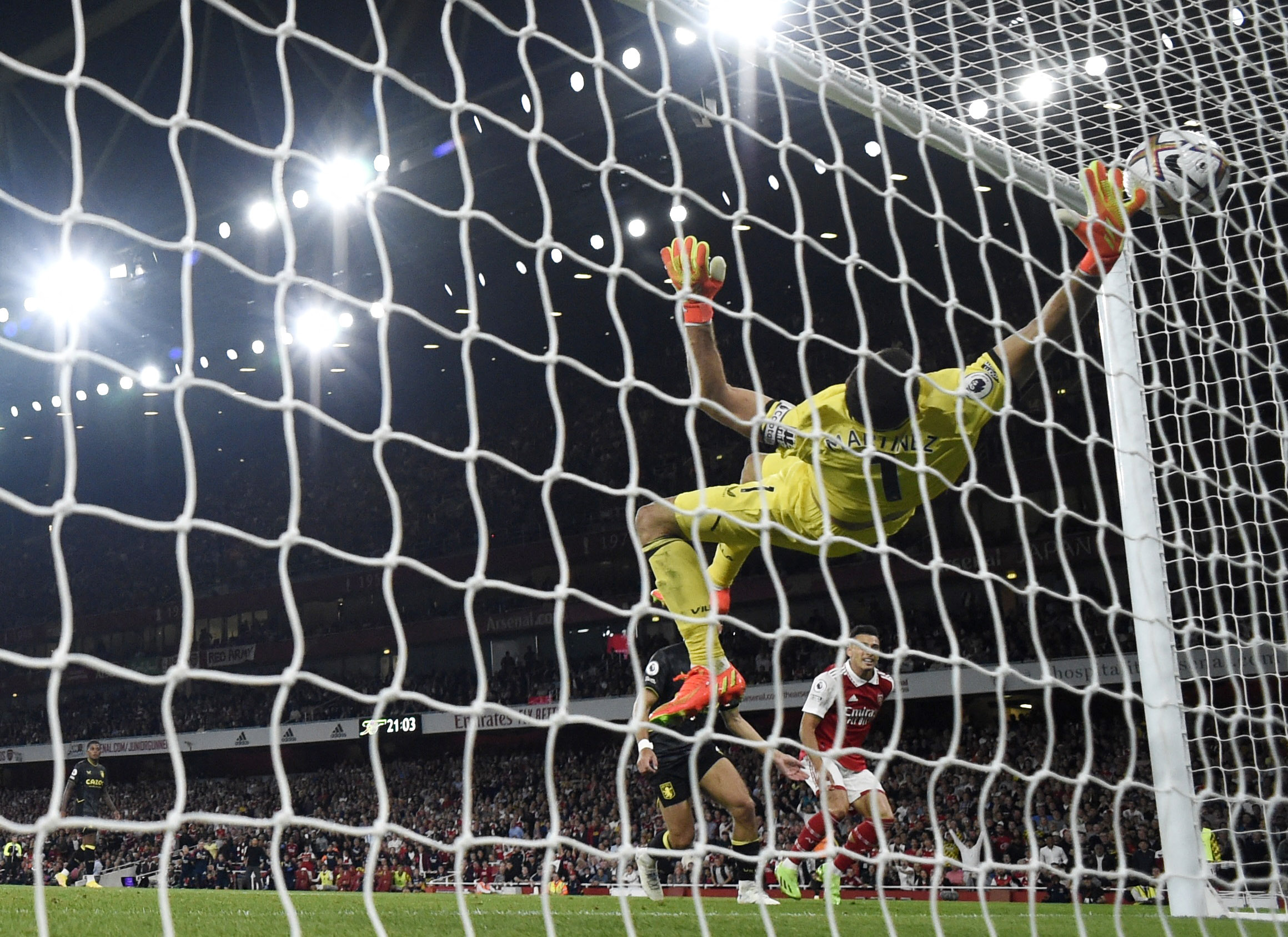 On Arsenal's second goal, Martinez was unable to knock out Martinelli's high shot