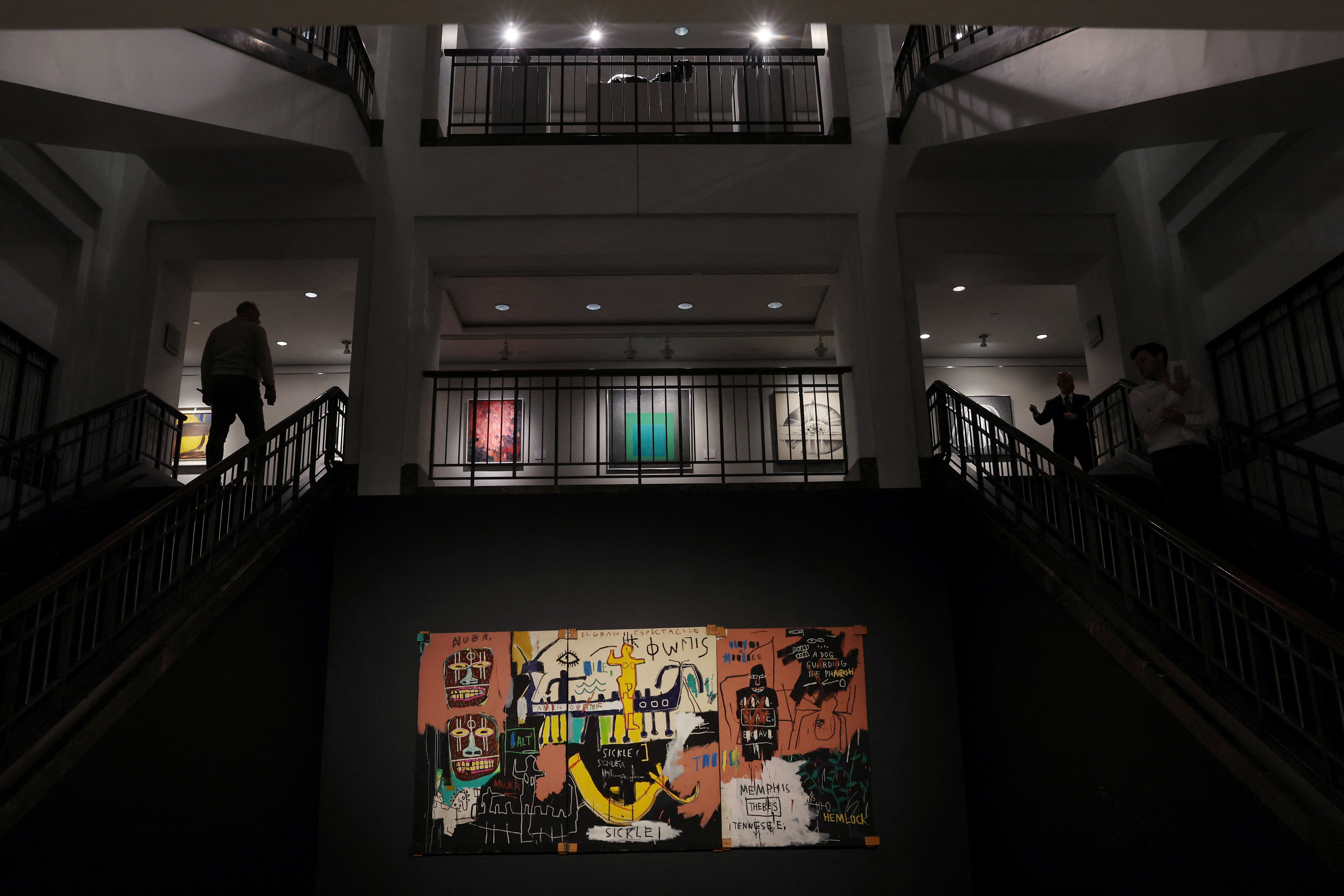 El gran tríptico de Jean-Michel Basquiat "El gran espectáculo (El Nilo)", de 1983, se expone en la casa de subastas Christie's antes de su venta en Nueva York (Foto de archivo: REUTERS/Shannon Stapleton NO REVENTAS. SIN ARCHIVOS)