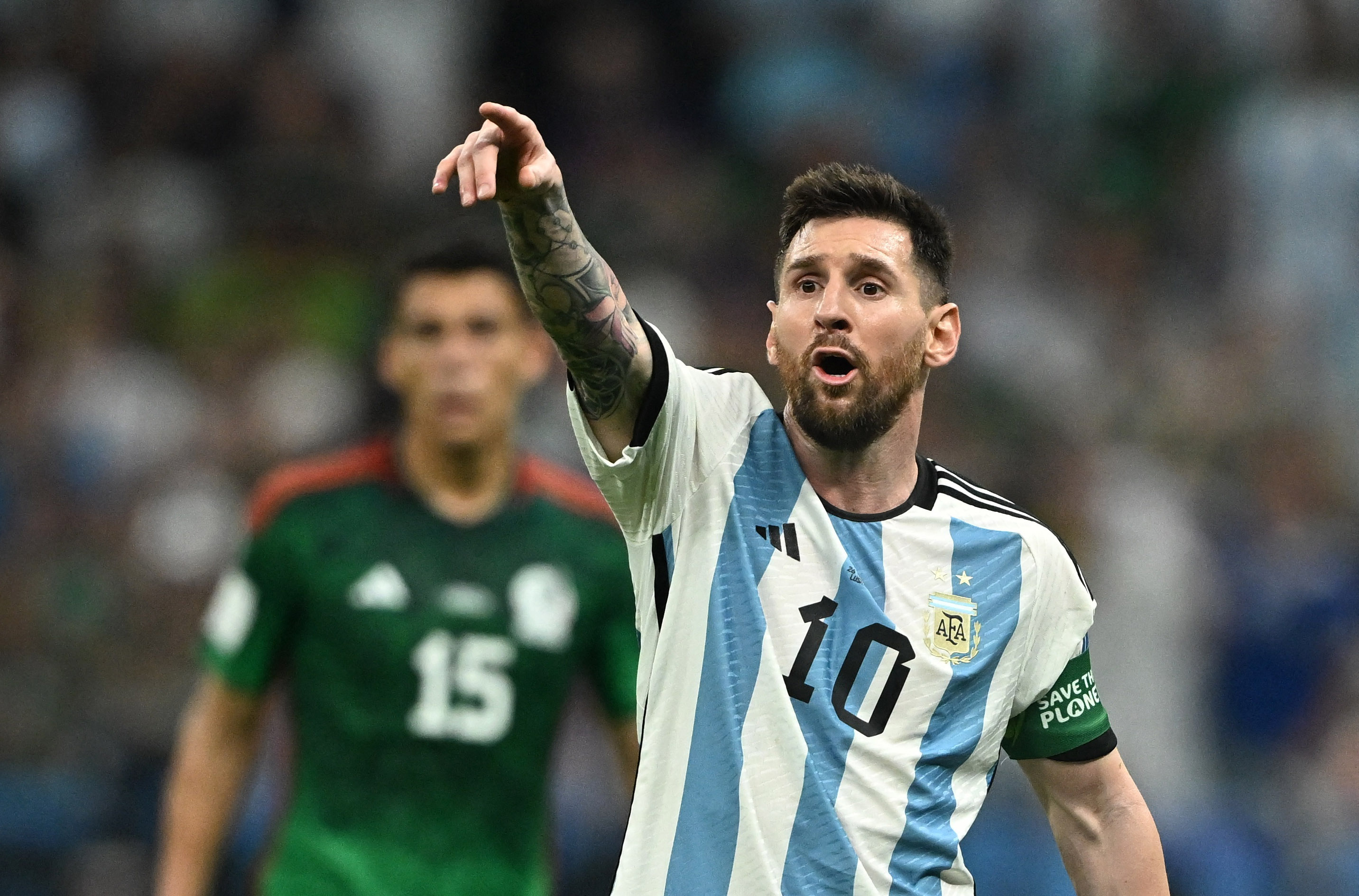 Soccer Football - FIFA World Cup Qatar 2022 - Group C - Argentina v Mexico - Lusail Stadium, Lusail, Qatar - November 26, 2022 Argentina's Lionel Messi reacts REUTERS/Dylan Martinez