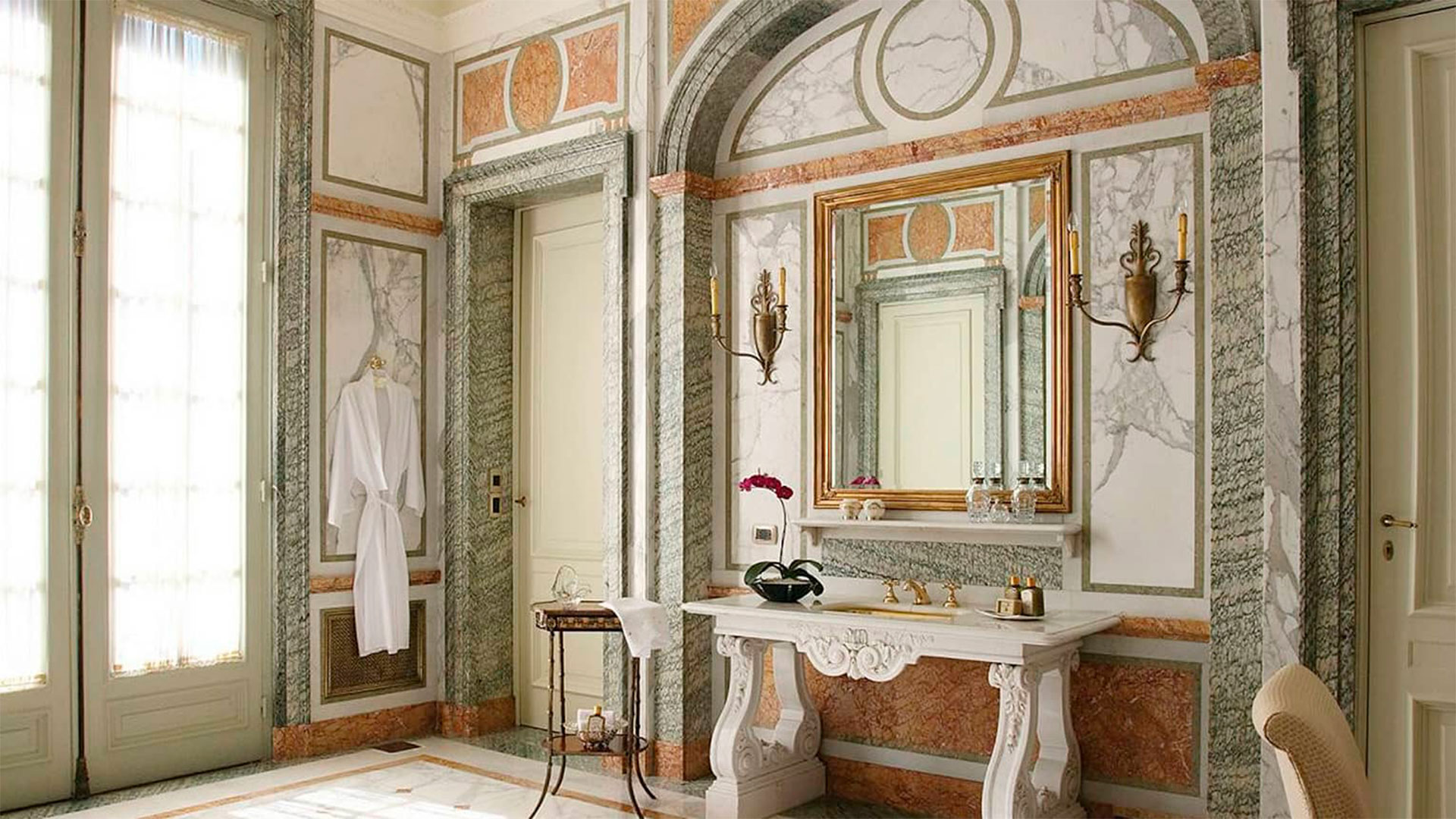 The bathroom is 30 meters long and covered in Italian marble with solid gold taps