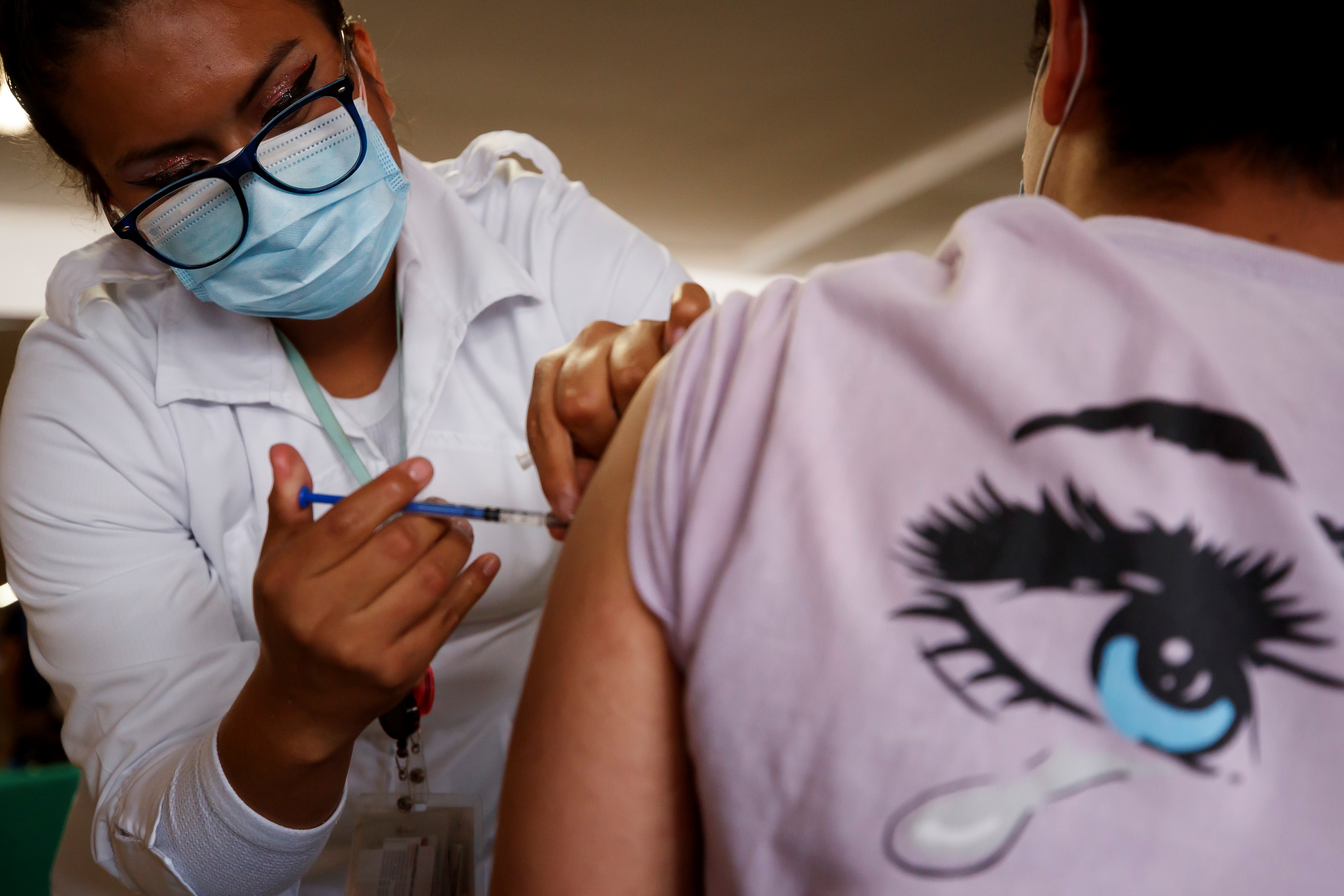Vacunación a menores de 11 años incoó este lunes (Foto: EFE/ José Méndez)