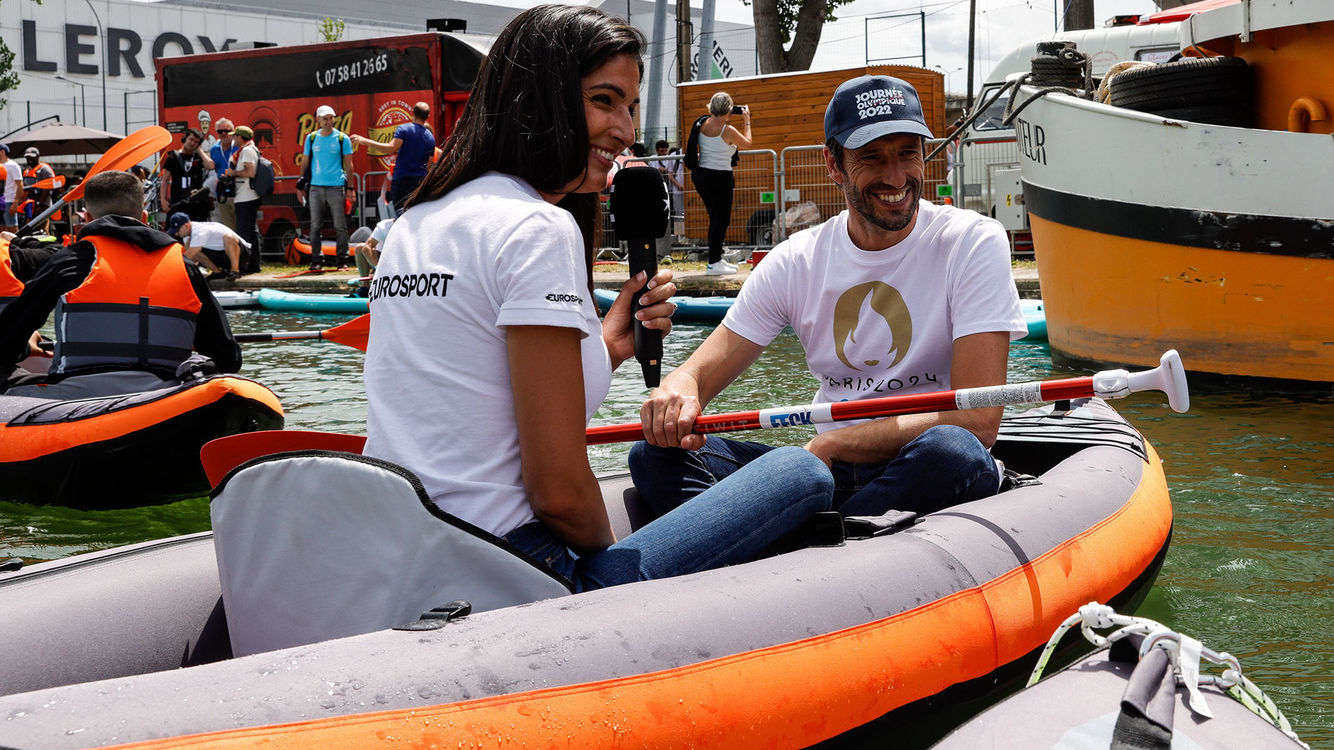 Paris 2024 president and Olympic canoe slalom champion Tony Estanguet chats and shares a boat with a Eurosport reporter during Olympic Day 2022 (Paris 2024)