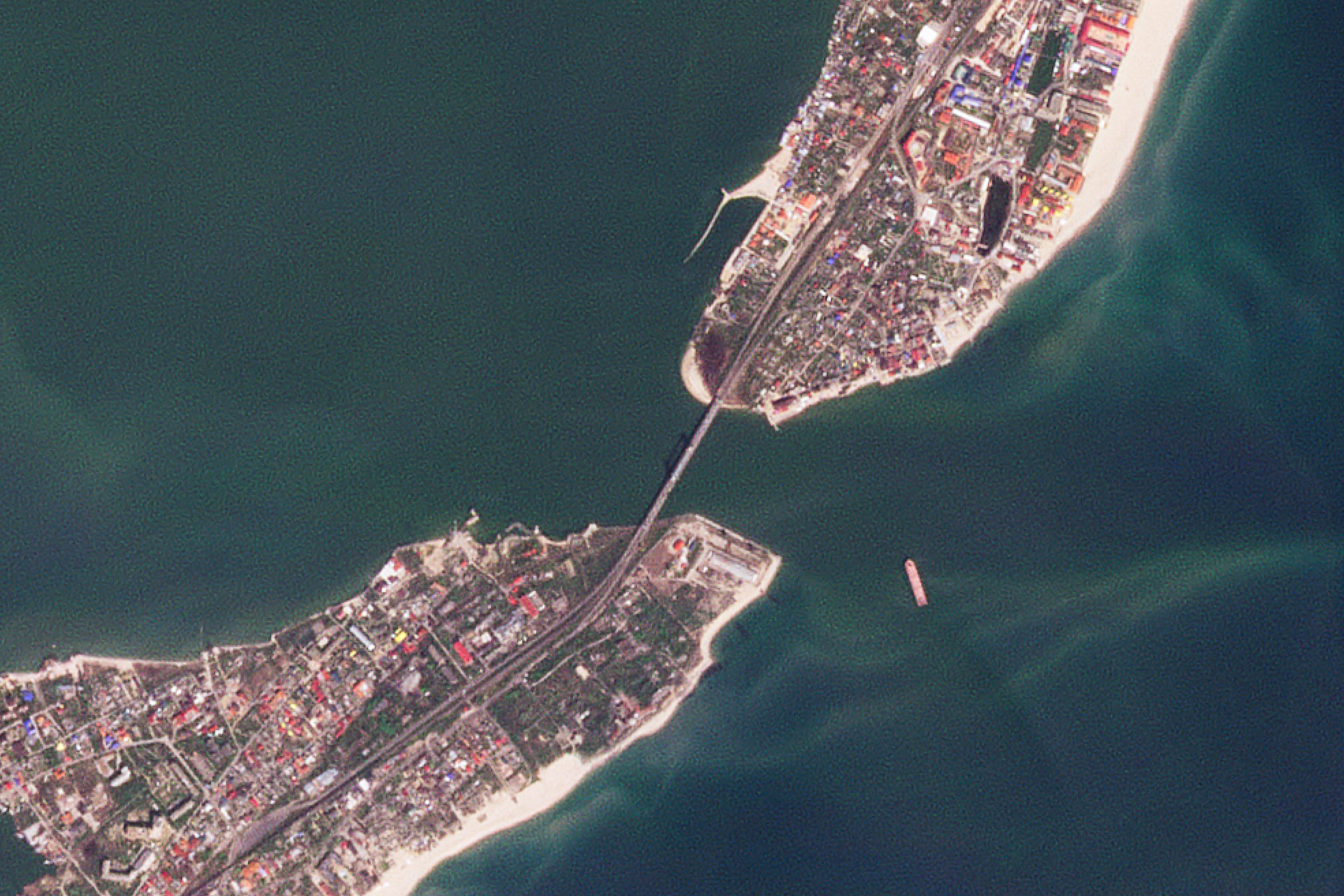 This satellite image taken by Planet Labs PBC shows a bridge repeatedly targeted by Russian missile strikes outside of Odesa, Ukraine, Monday, May 2, 2022. (Planet Labs PBC via AP)