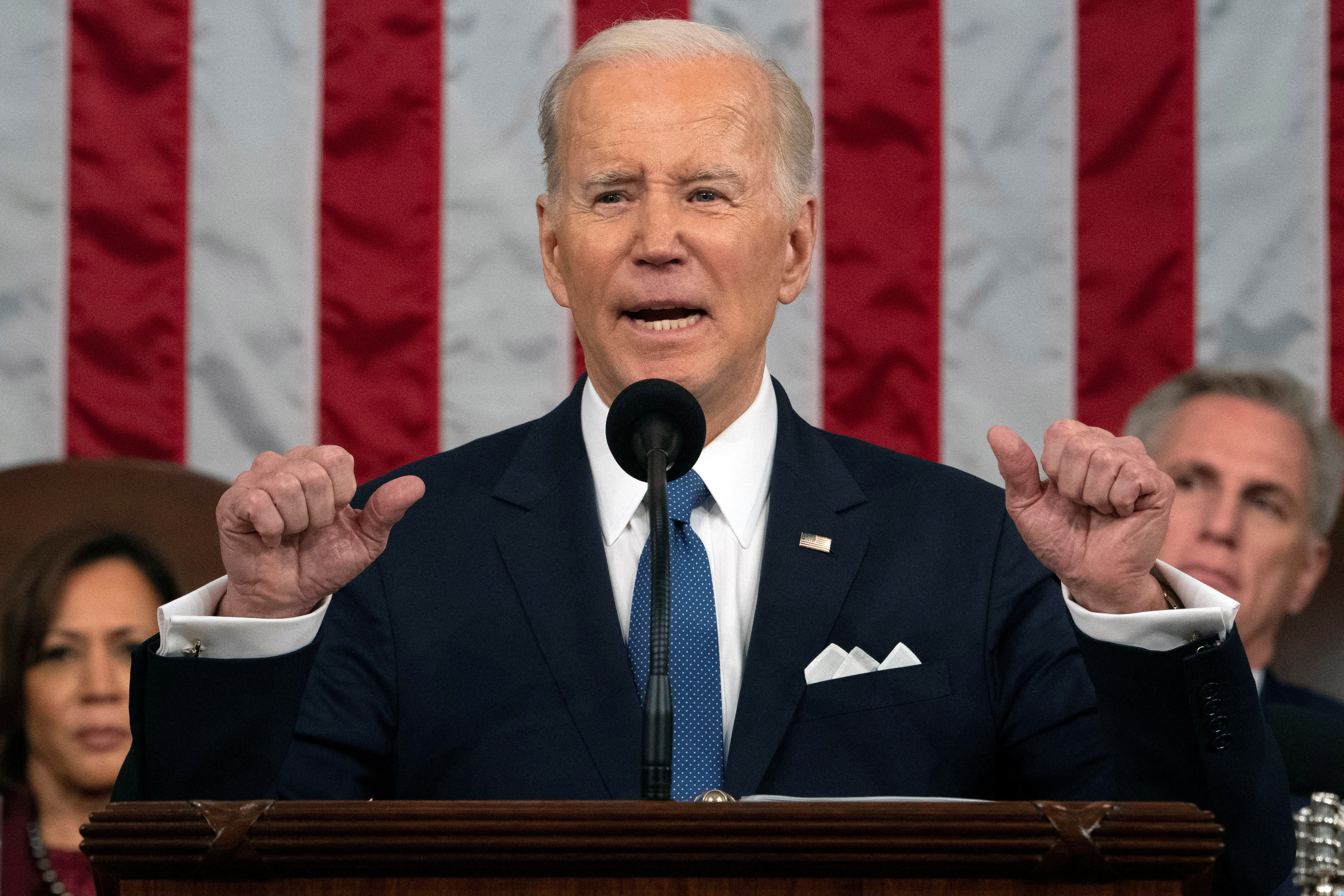 President Joe Biden delivers the State of the Union address to a joint session of Congress at the U.S. Capitol, Tuesday, Feb. 7, 2023, in Washington, as Vice President Kamala Harris and House Speaker Kevin McCarthy of Calif., listen.   Jacquelyn Martin/Pool via REUTERS