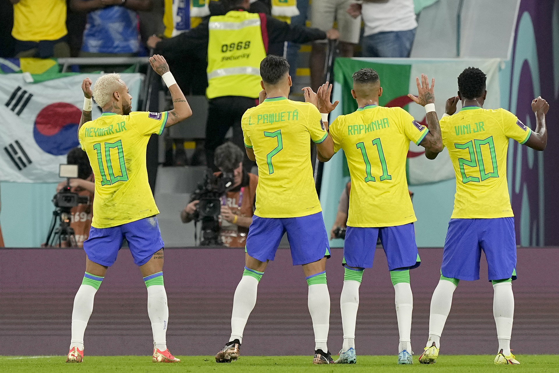 Brazil's Neymar, left, celebrates after scoring his side's second goal from the penalty spot during the World Cup round of 16 soccer match between Brazil and South Korea, at the Education City Stadium in Al Rayyan, Qatar, Monday, Dec. 5, 2022. (AP Photo/Martin Meissner)