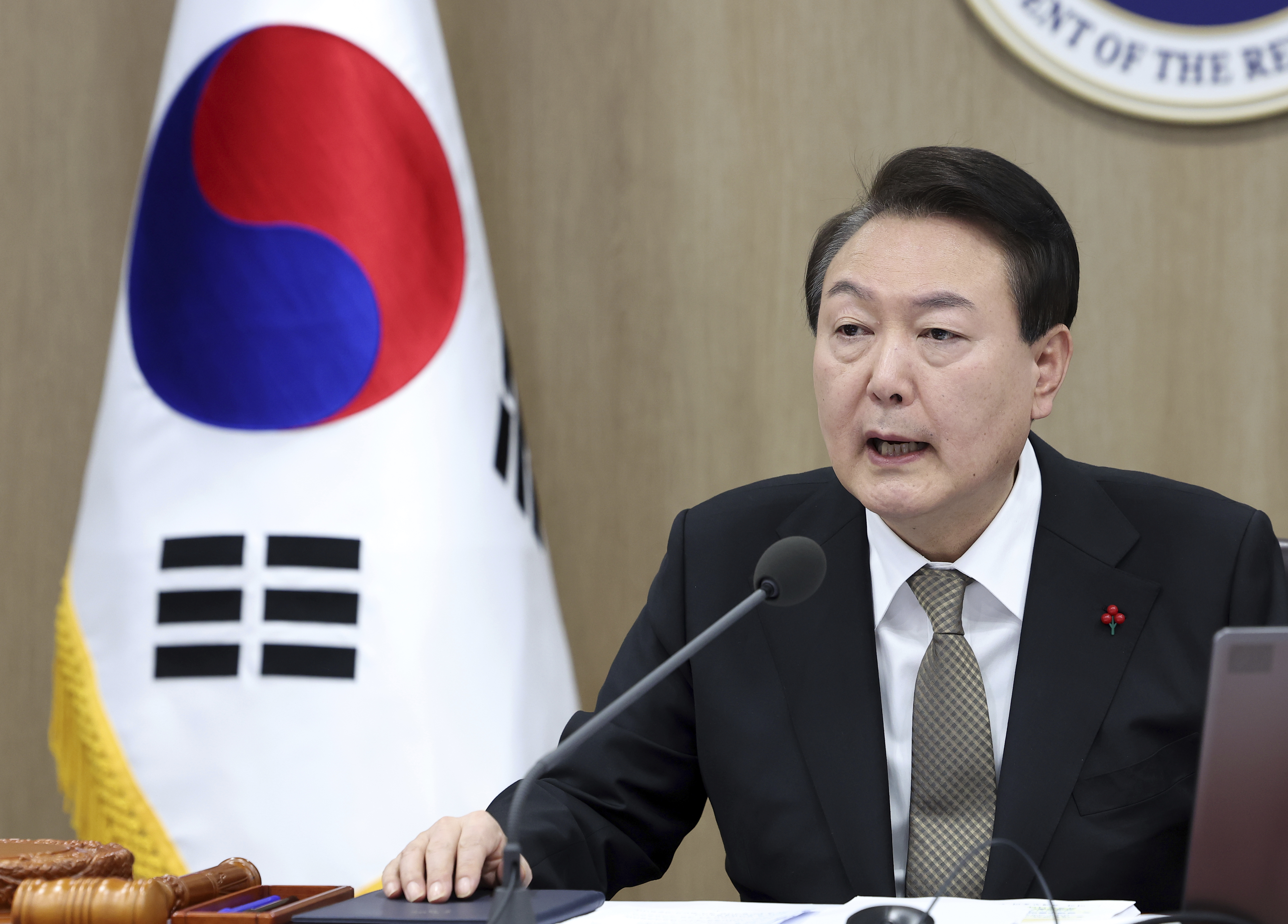 South Korean President Yoon Suk-yeol speaks during a cabinet council meeting at the presidential office in Seoul, South Korea, Tuesday, Dec. 27, 2022.  (via Im Hun-jung/Yonhap AP)