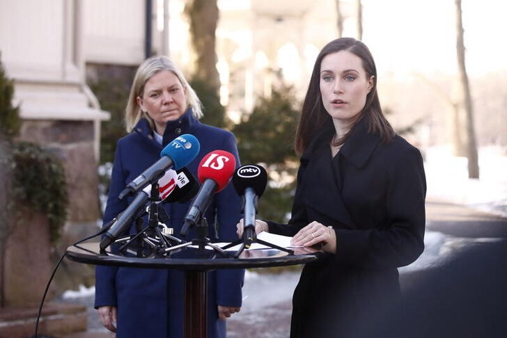 Finnish Prime Minister Sanna Marin (R) and her Swedish counterpart Magdalena Andersson hold a press conference outside the Kesaranta official residence in Helsinki, Finland.  Roni Rekomaa/Lehtikuva/via Reuters. 