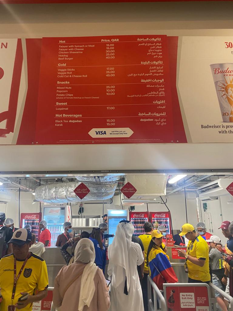 The public packed at halftime of the match between Qatar and Ecuador to buy drinks and food