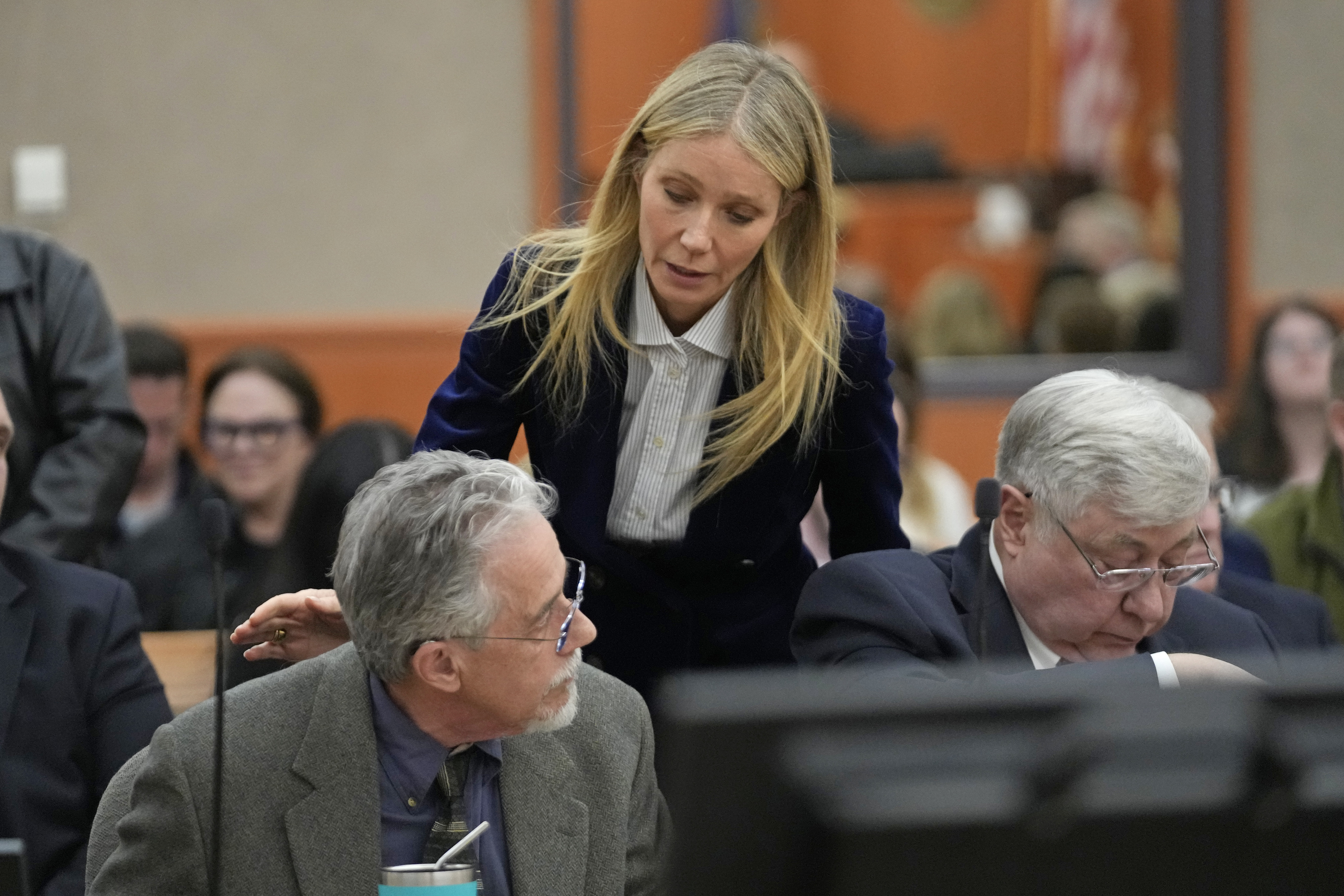 FILE- Gwyneth Paltrow speaks with retired optometrist Terry Sanderson, left, as she leaves court after the verdict was read in her ski accident trial on March 30, 2023, in Park City, Utah.  In a decision released Saturday, April 29, 2023, the court upheld a jury verdict that found Paltrow was not at fault in a 2016 collision with Terry Sanderson and said Sanderson would not be required to pay Paltrow's attorneys' fees. Paltrow and had agreed not to appeal the verdict.  (AP Photo/Rick Bowmer, Pool, File)