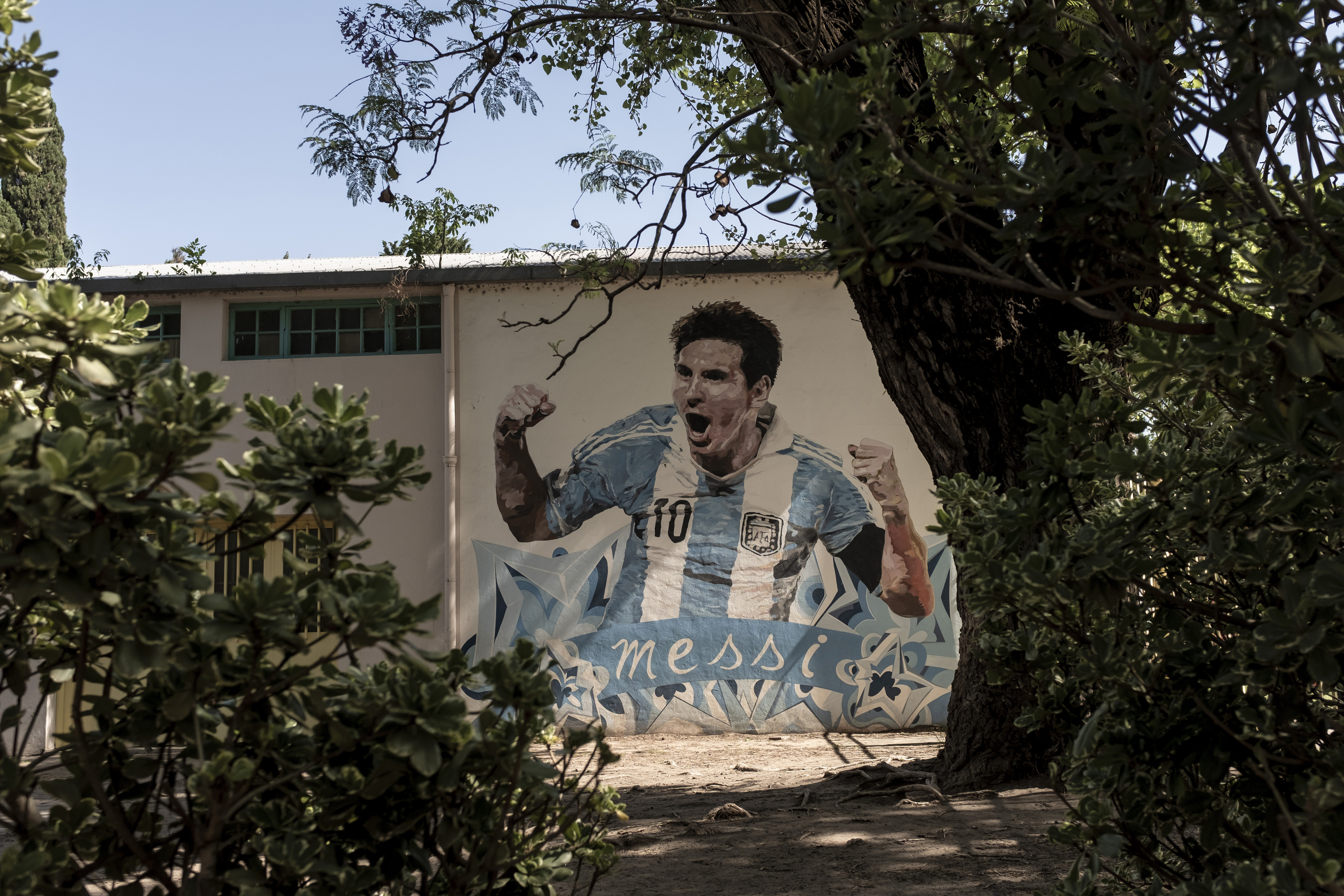 A mural of Messi at School No. 66 General Las Heras in Rosario, which he attended as a child.  MUST CREDIT: Photo for The Washington Post by Anita Pouchard Serra