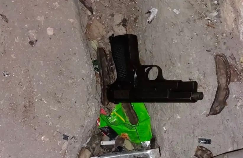 The weapon the terrorist was using in the shooting (POLICE SPOKESMAN UNIT)