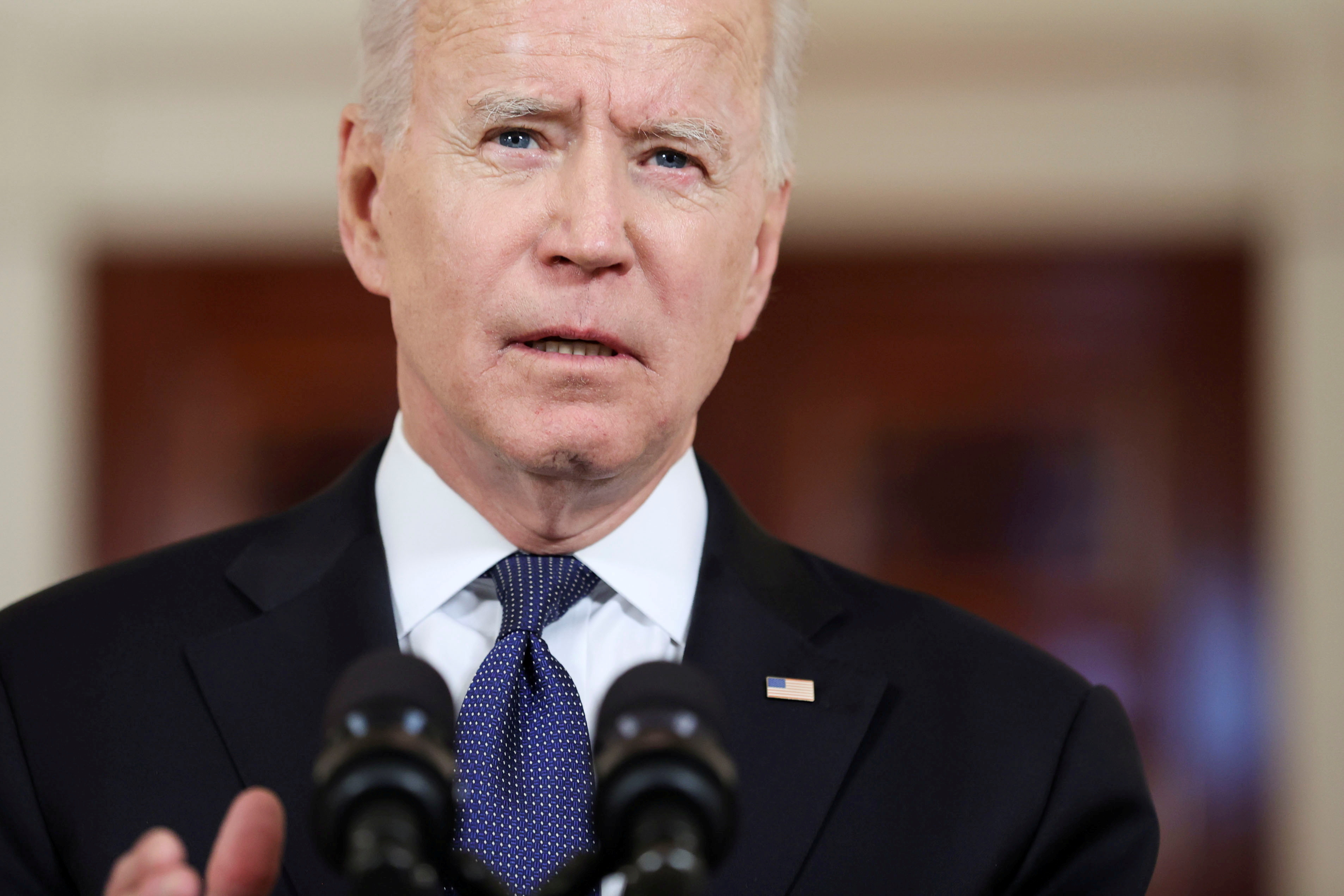 FILE PHOTO: U.S. President Joe Biden delivers remarks during a brief appearance in the Cross Hall at the White House in Washington, U.S., May 20, 2021. REUTERS/Jonathan Ernst/File Photo