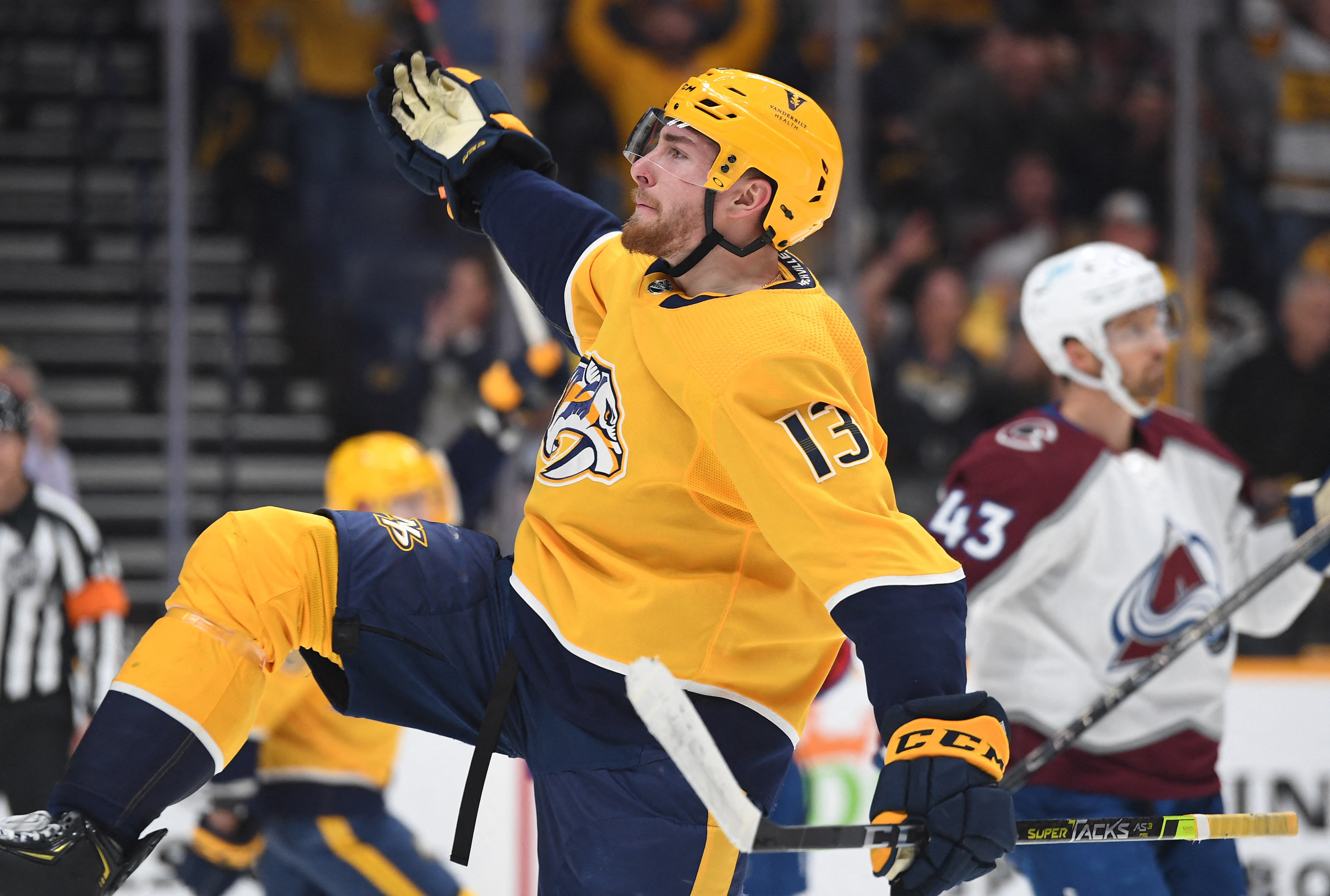 May 9, 2022; Nashville, Tennessee, USA; Nashville Predators center Yakov Trenin (13) celebrates after a goal during the first period against the Colorado Avalanche in game four of the first round of the 2022 Stanley Cup Playoffs at Bridgestone Arena. Mandatory Credit: Christopher Hanewinckel-USA TODAY Sports