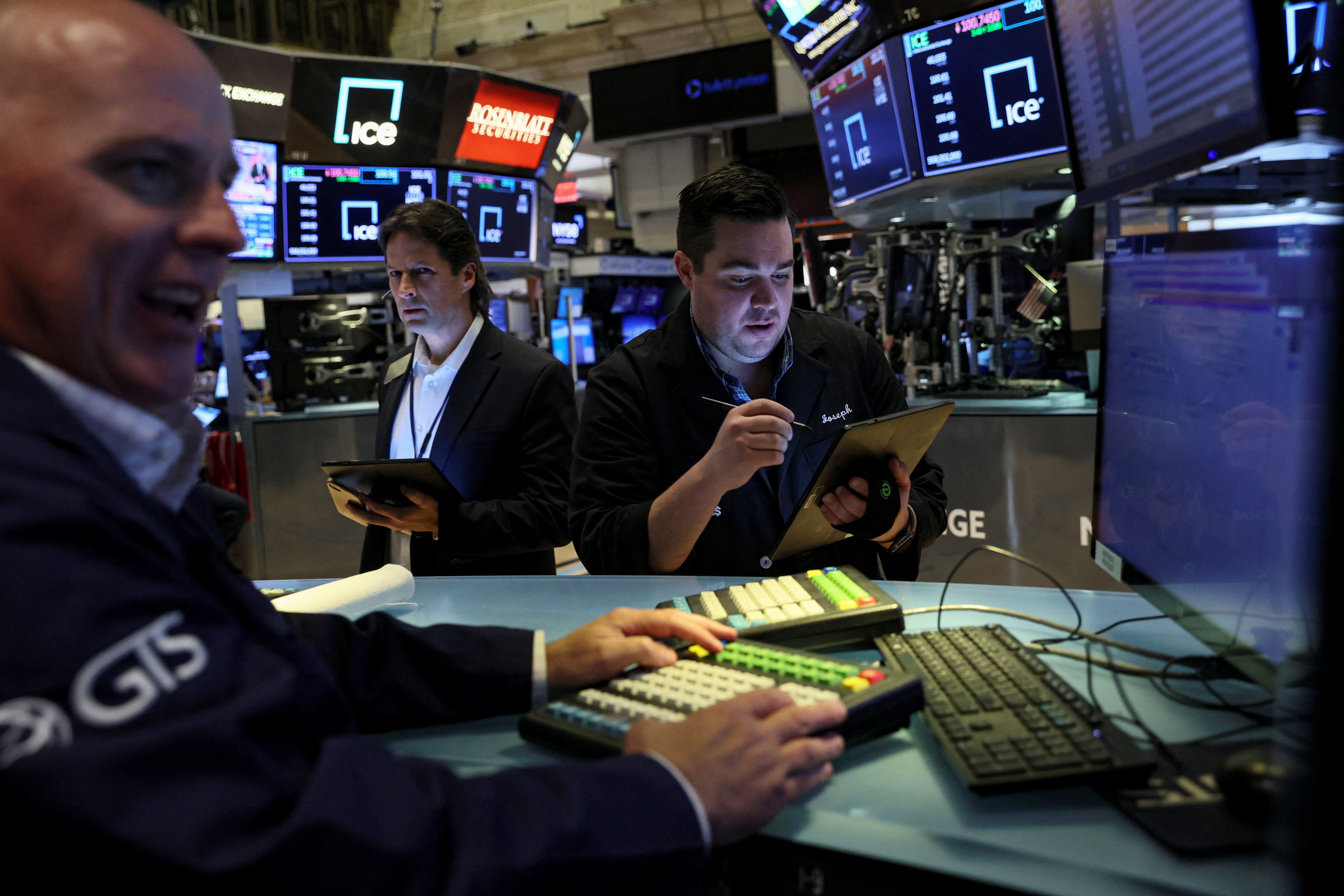 Traders work on the floor of the New York Stock Exchange (NYSE) in New York City, U.S., November 10, 2022. REUTERS/Brendan McDermid