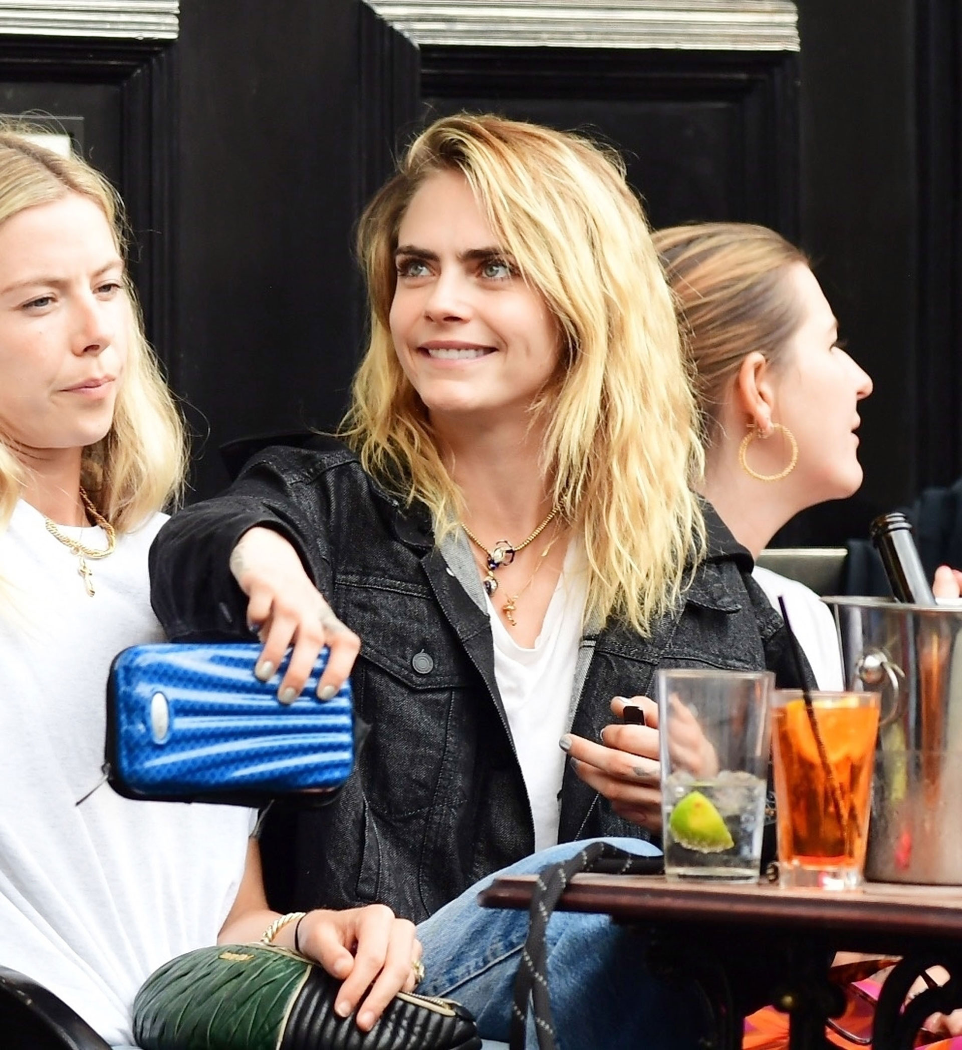 British model Cara Delevingne enjoys a few drinks with friends in a pub in Notting Hill, London (Photo: The Grosby Group)