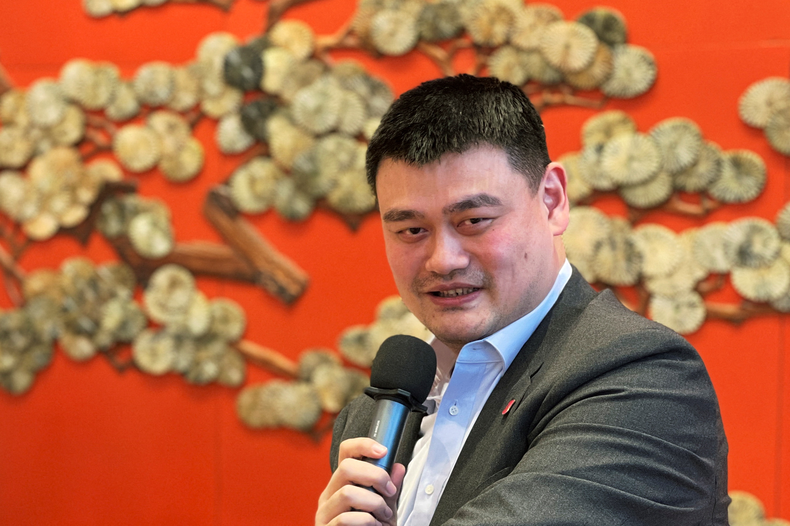 President of Chinese Basketball Association and Ice and Snow Sports Promotion Ambassador Yao Ming attends a media event ahead of the Beijing 2022 Winter Olympics in Beijing, China January 17, 2022. REUTERS/Yew Lun Tian