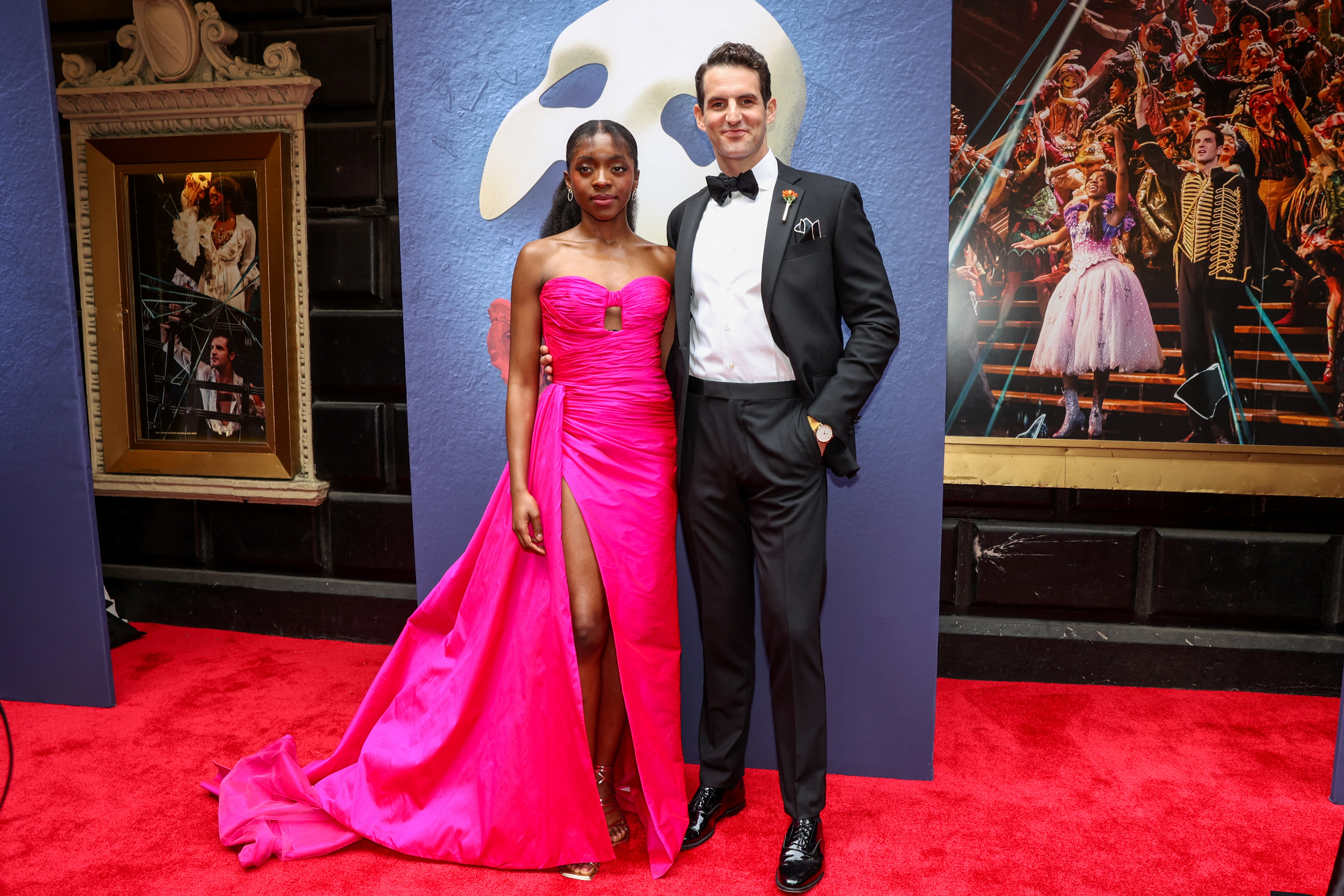 Emilie Kouatchou, who plays Christine Daae, and John Riddle, who plays Raoul, on the red carpet before the final performance of the Phantom of the Opera.  (PHOTO: REUTERS/Caitlin Ochs)