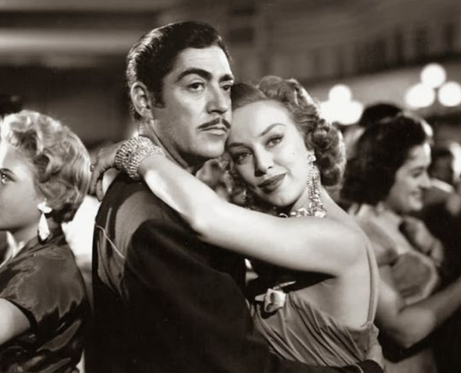 Con otro actor mexicano, Luis Aguilar, en la película "No me olvides nunca" (1956)