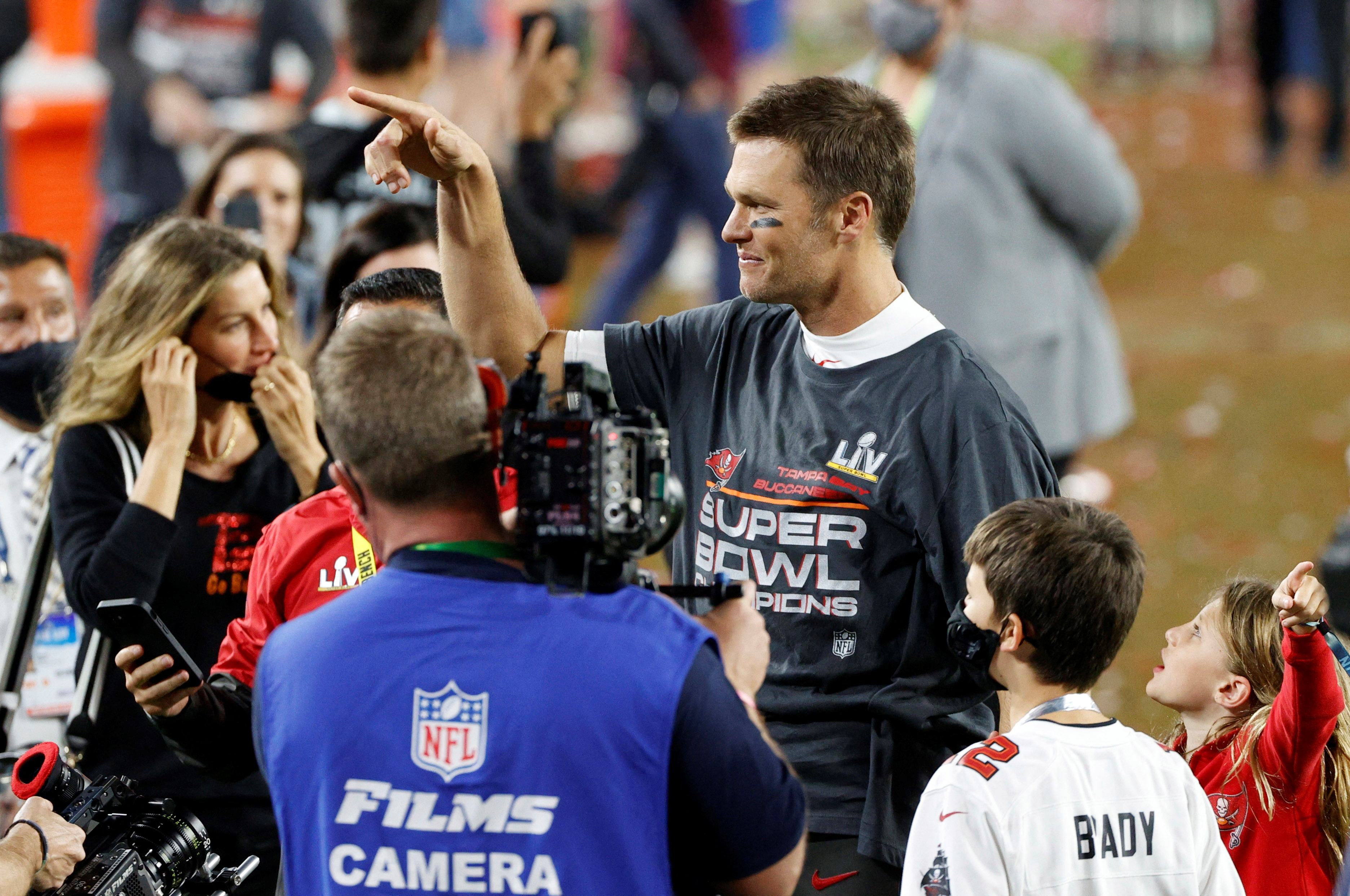 FILE PHOTO: NFL Football - Super Bowl LV - Tampa Bay Buccaneers v Kansas City Chiefs - Raymond James Stadium, Tampa, Florida, U.S. - February 7, 2021 Tampa Bay Buccaneers' Tom Brady celebrates with his wife, Gisele Bundchen, after winning the Super Bowl LV REUTERS/Shannon Stapleton/File Photo