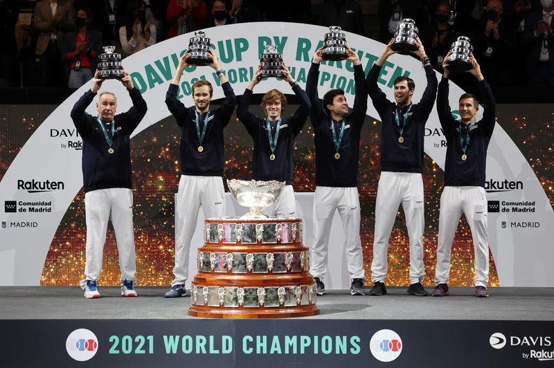 The Russian Tennis Federation team celebrates with trophies after winning the Davis Cup, at the Madrid Arena, Madrid, Spain - December 5, 2021. REUTERS/Sergio Perez