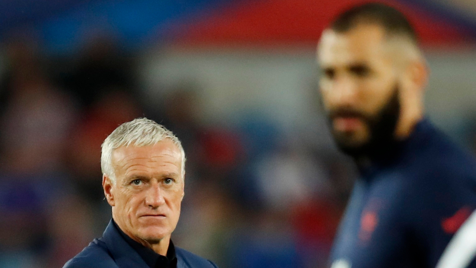 Soccer Football - World Cup - UEFA Qualifiers - Group D - France v Bosnia and Herzegovina - Stade de la Meinau, Strasbourg, France - September 1, 2021 France coach Didier Deschamps looks on before the match with France's Karim Benzema seen in the foreground REUTERS/ Gonzalo Fuentes