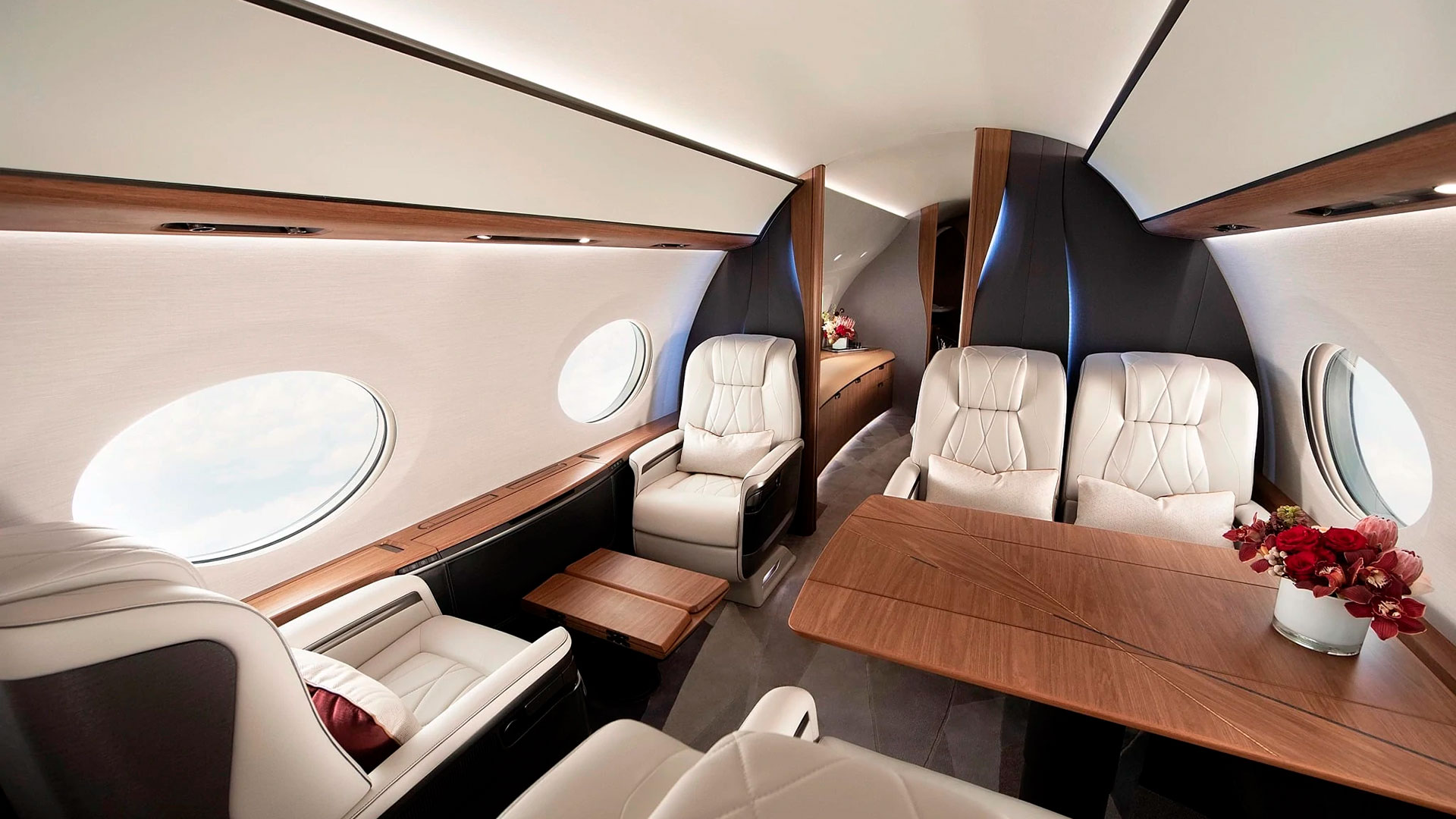 The plane has panoramic oval windows and seats that can be converted into comfortable beds