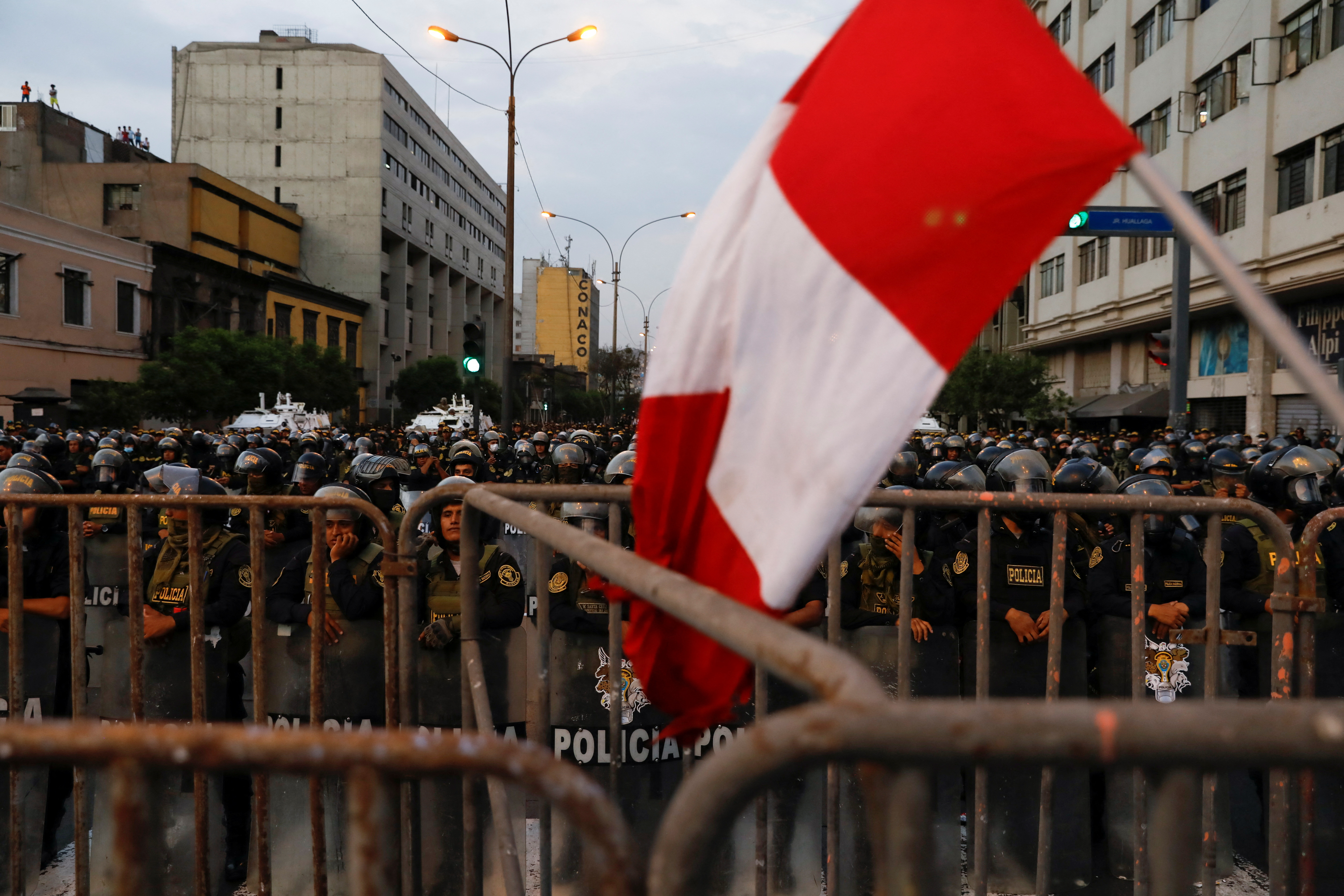 Riot police officers stand guard during a protest to demand Peru's President Dina Boluarte to step down, in Lima, Peru, January 31, 2023. REUTERS/Alessandro Cinque
