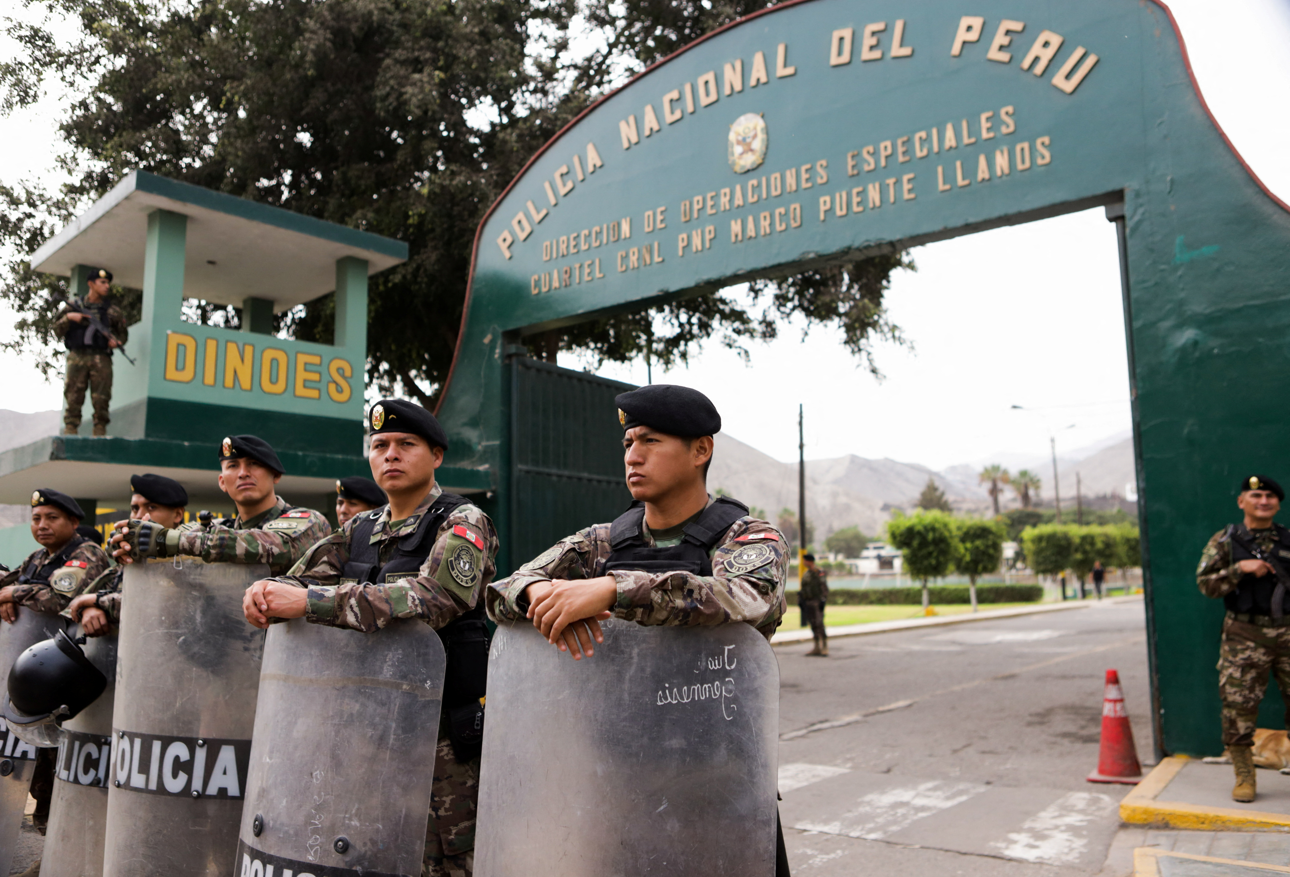 Police stand guard outside the facilities of the Directorate of Special Operations (DIROES) where Peru's former President Alejandro Toledo is expected to arrive following his extradition to Peru, in Lima, Peru April 23, 2023. REUTERS/Liz Tasa