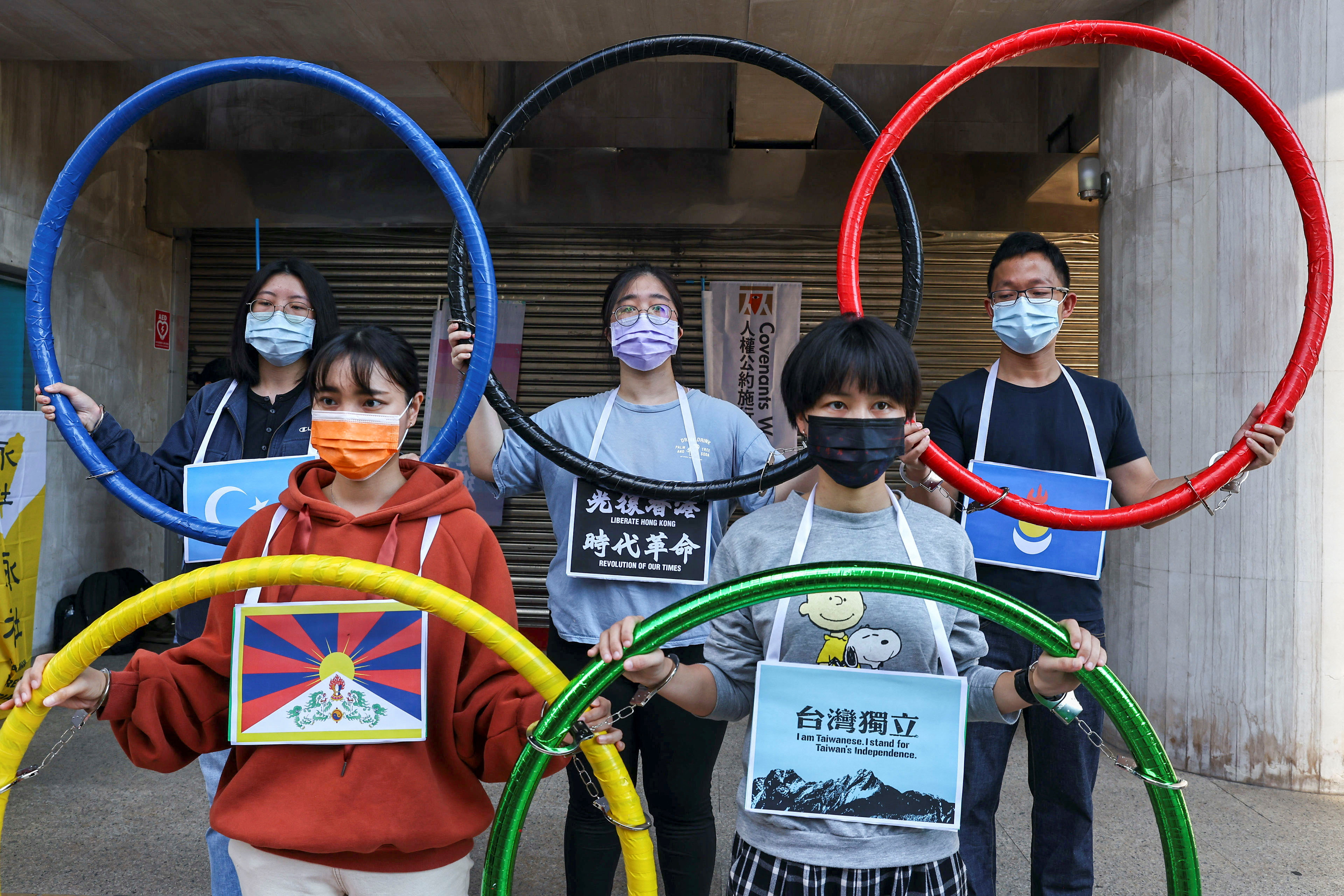 Activists hold a protest against Beijing holding the winter Olympics, in Taipei, Taiwan, January 26, 2022. REUTERS/Ann Wang