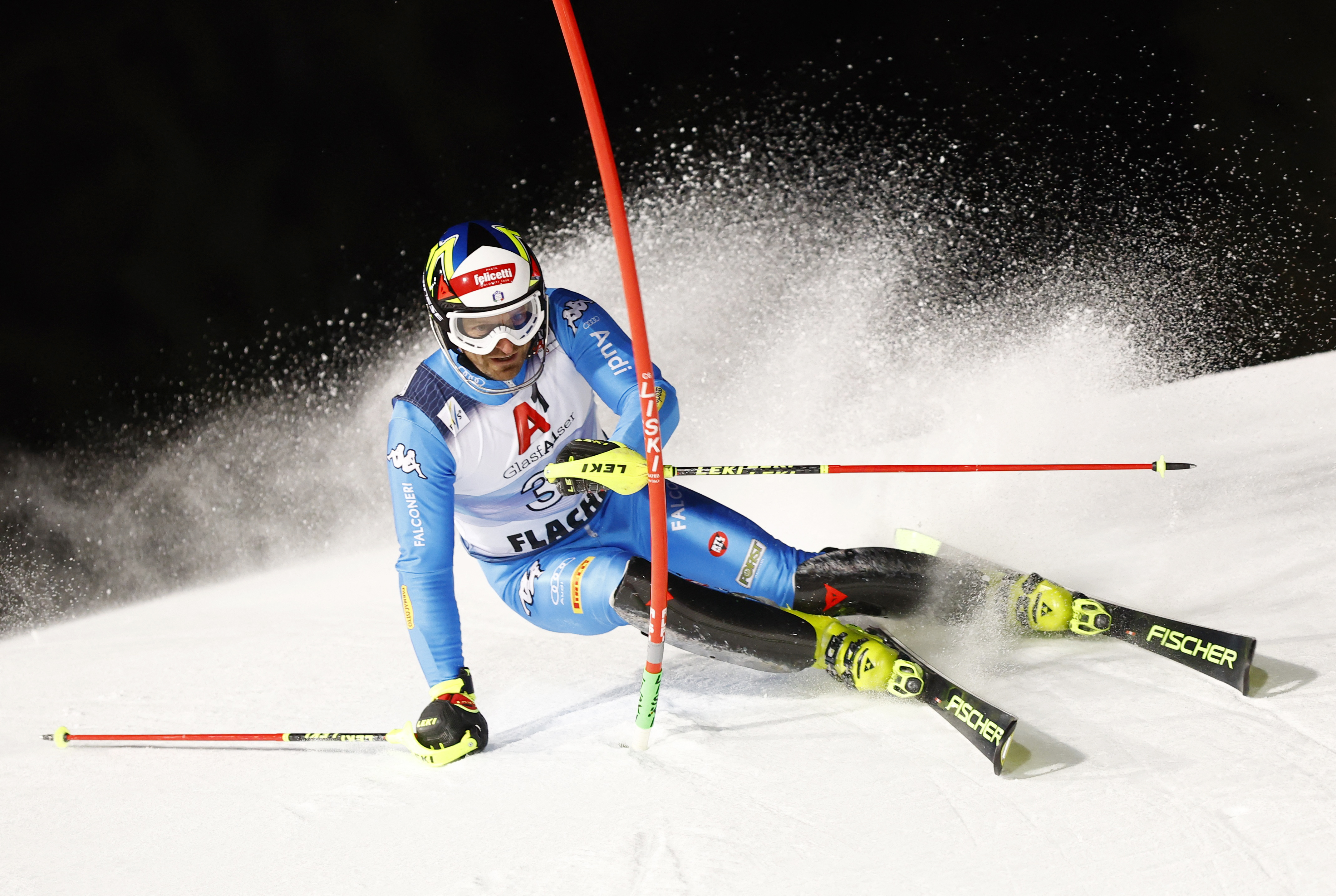 Alpine Skiing - FIS Alpine Ski World Cup - Men's night Slalom - Flachau, Austria - March 9, 2022 Italy's Manfred Molgg in action during the first run and his last ever race REUTERS/Lisa Leutner