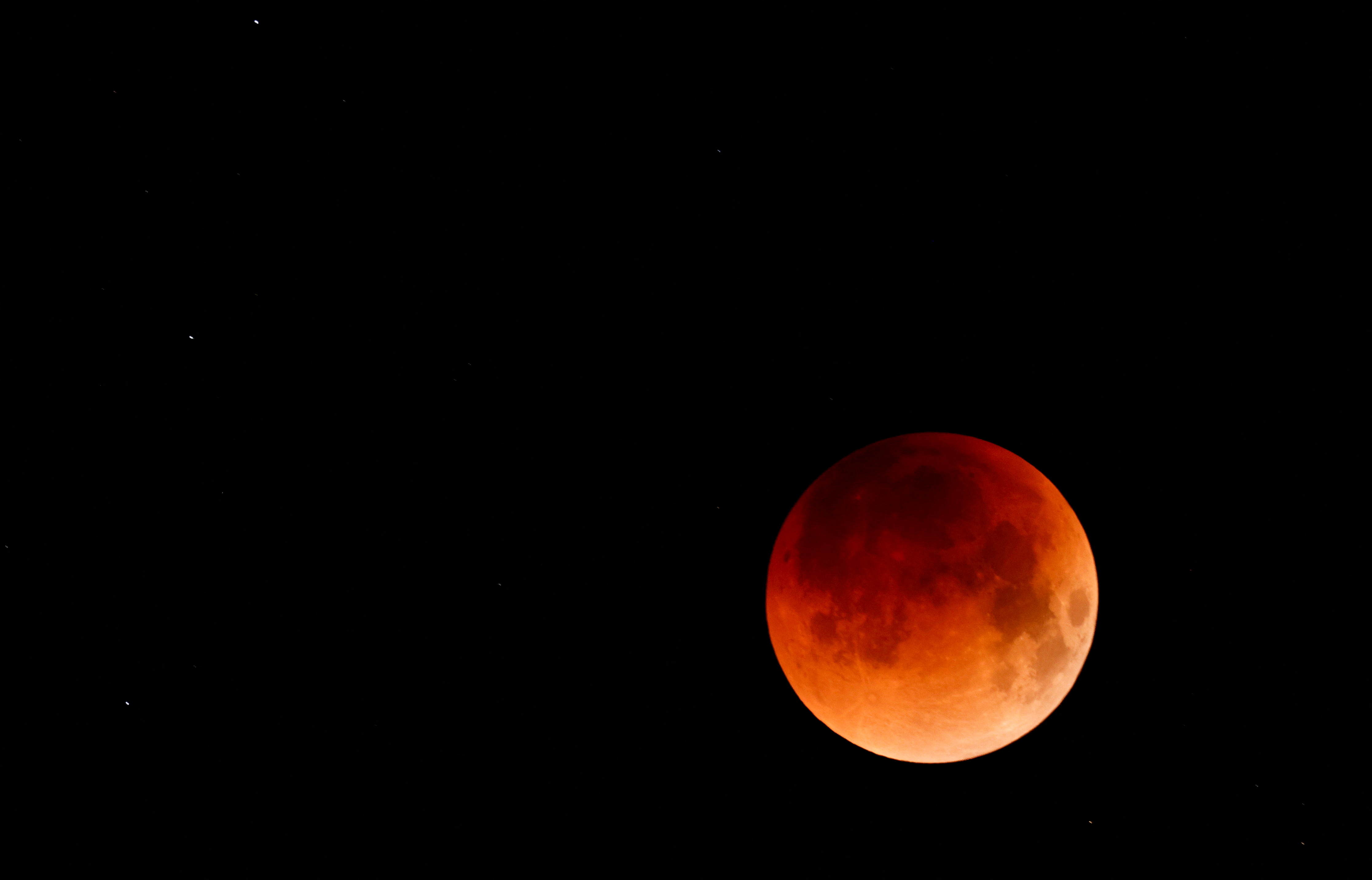 The moon is seen during a lunar eclipse over the island of Gran Canaria, Spain (Reuters)