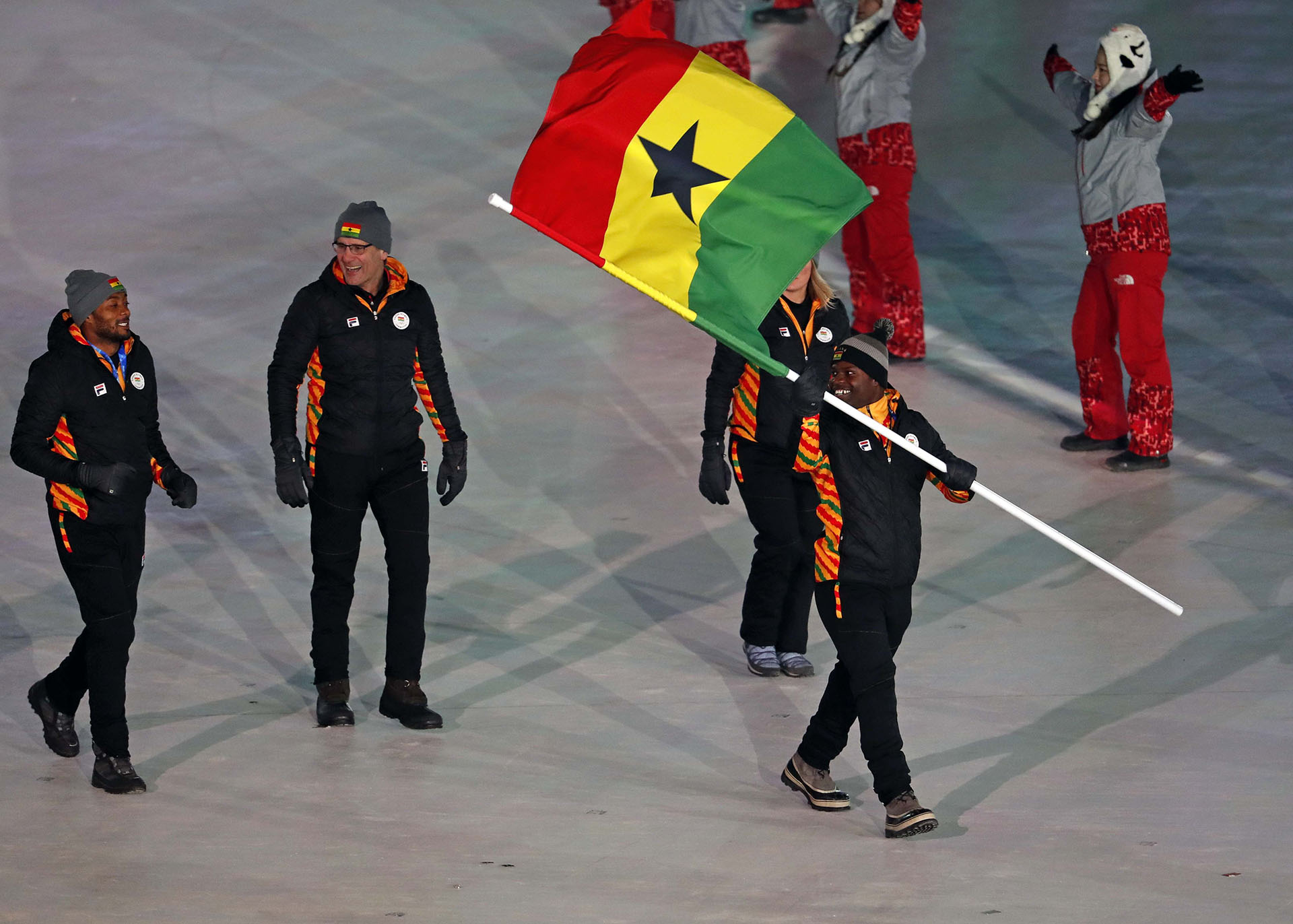 Pyeongchang 2018 Winter Olympics – Opening ceremony – Pyeongchang Olympic Stadium - Pyeongchang, South Korea – February 9, 2018 - Akwasi Frimpong of Ghana carries the national flag. REUTERS/Damir Sagolj