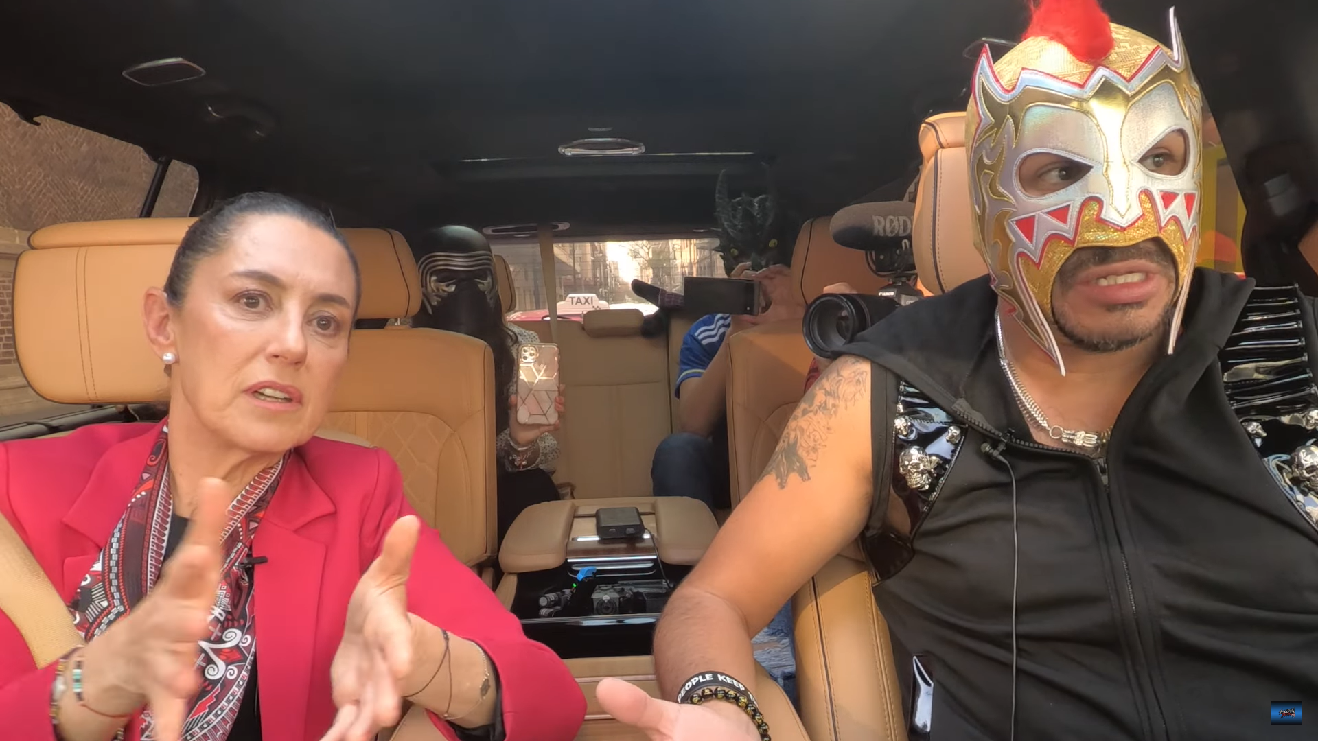 Claudia Sheinbaum behind the wheel with the Golden Scorpion (YouTube/PelucheEnElEstuche)