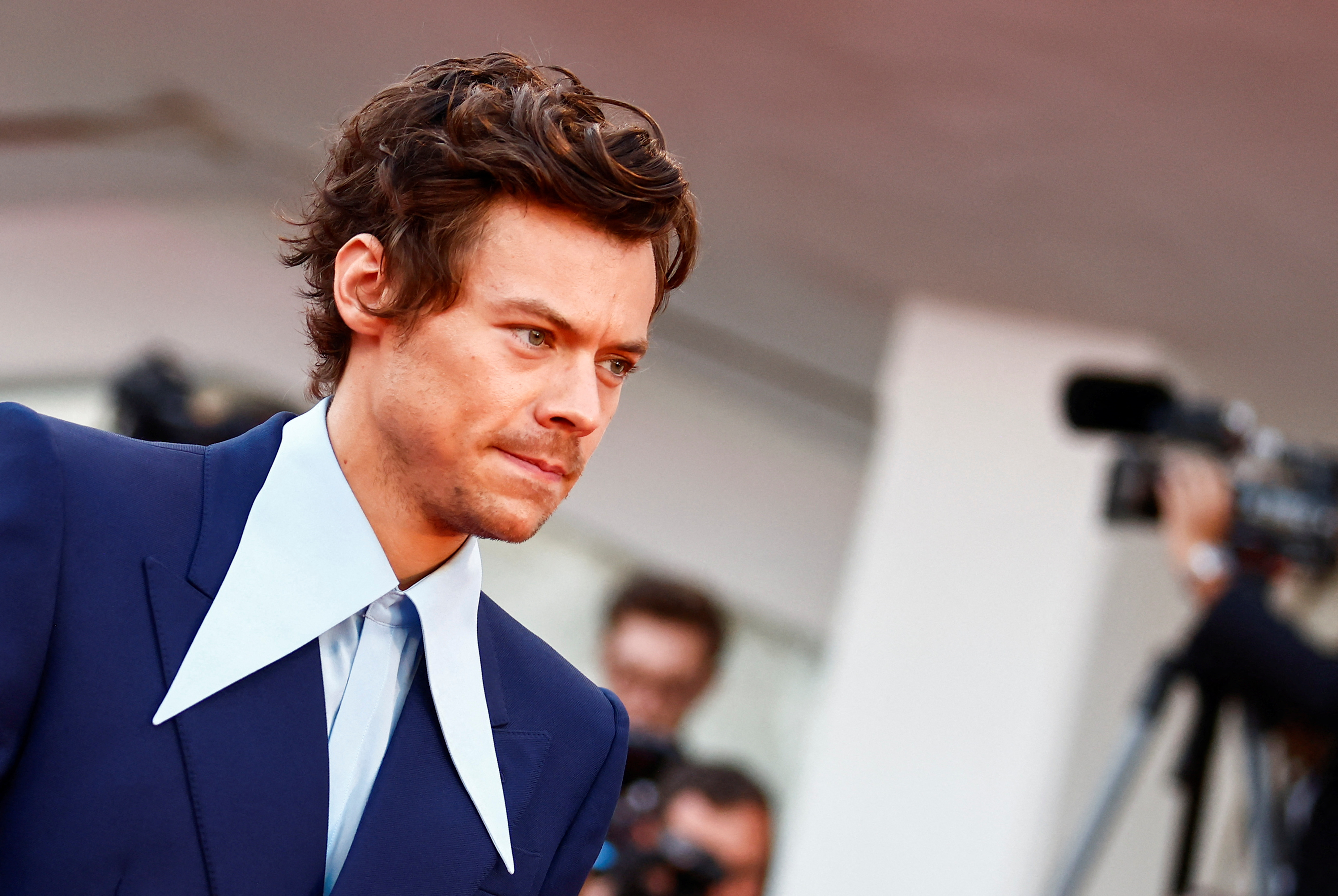 The 79th Venice Film Festival - Premiere screening of the film "Don't Worry Darling" out of competition - Red Carpet Arrivals - Venice, Italy, September 5, 2022 - Cast member Harry Styles attends. REUTERS/Yara Nardi