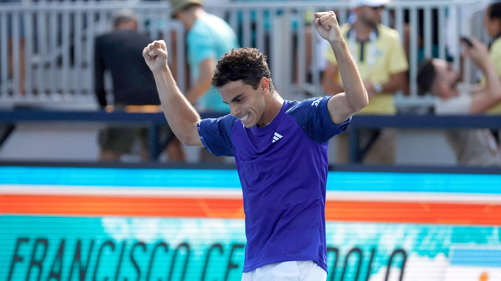 Mar 27, 2023; Miami, Florida, US; Francisco Cerundolo (ARG) celebrates after his match against Felix Auger-Aliassime (CAN) on day eight of the Miami Open at Hard Rock Stadium. Mandatory Credit: Geoff Burke-USA TODAY Sports