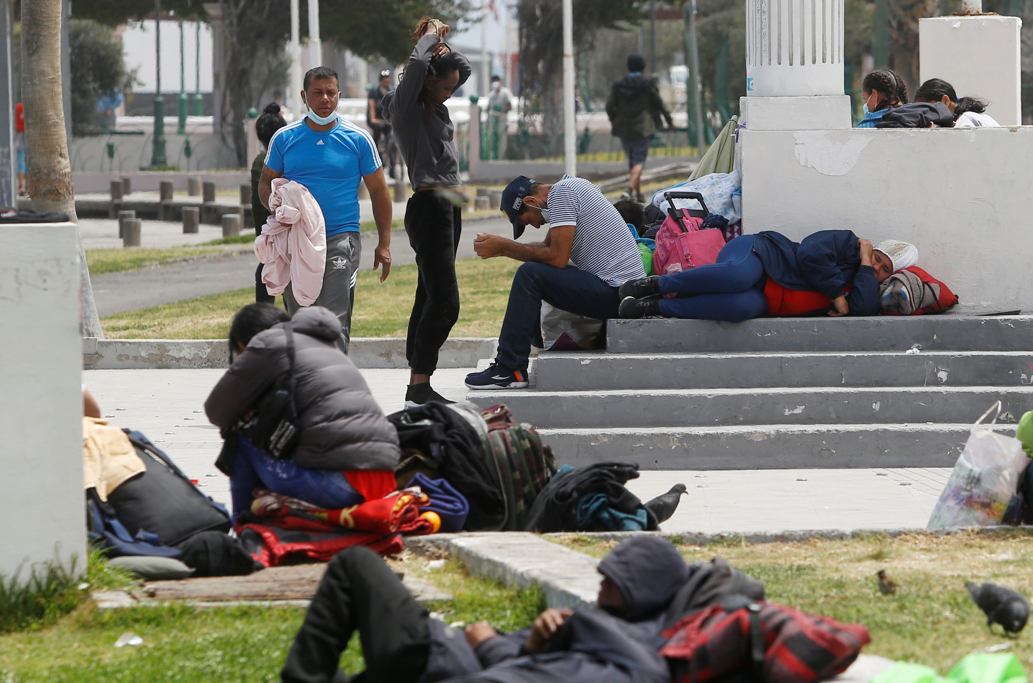 Un grupo de migrantes venezolanos en la ciudad de Iquique, en Chile. REUTERS/Alex Diaz NO RESALES. NO ARCHIVES