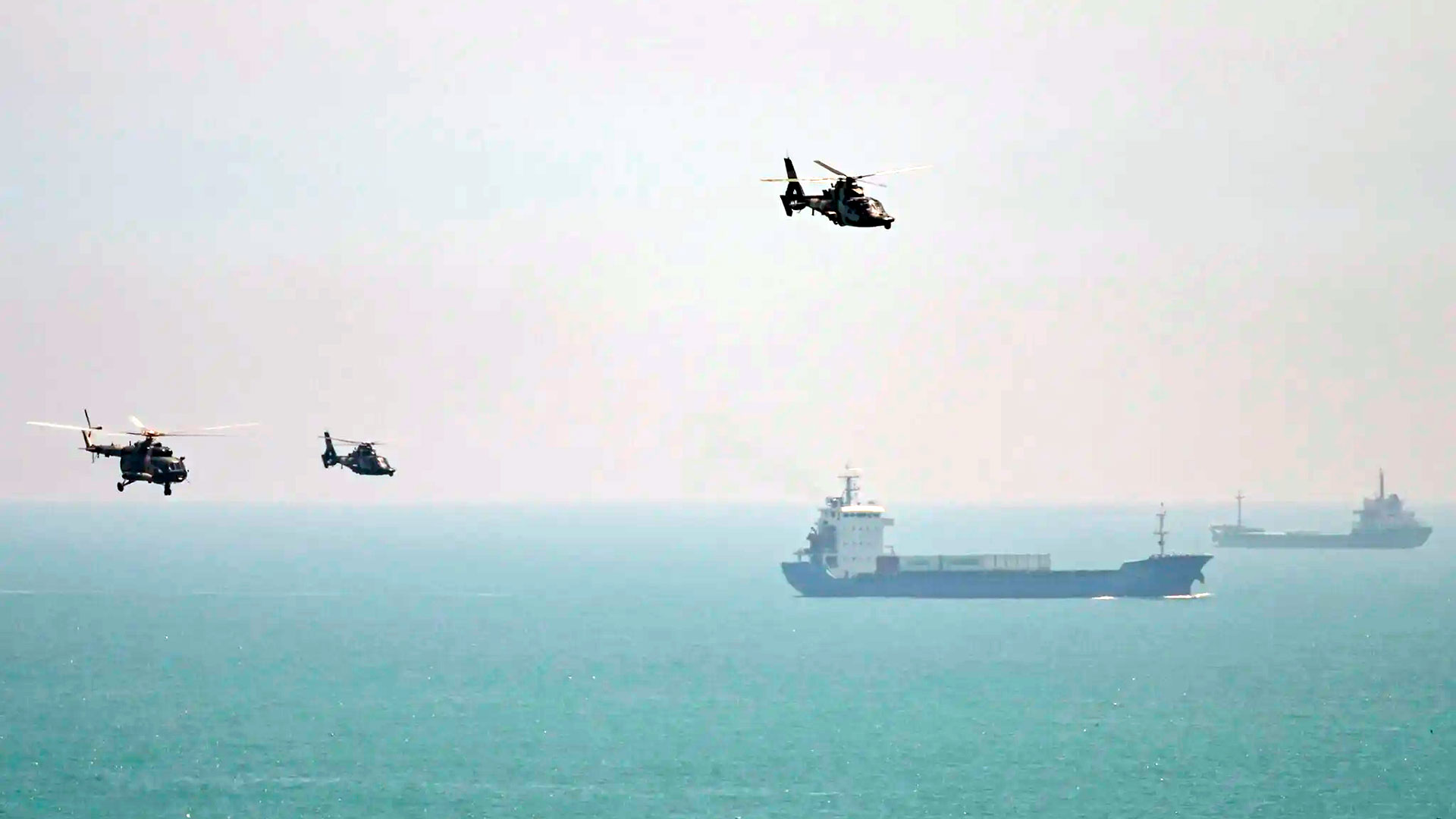 Chinese military helicopters off the coast of Fujian province, across the Taiwan Strait.  File / AFP