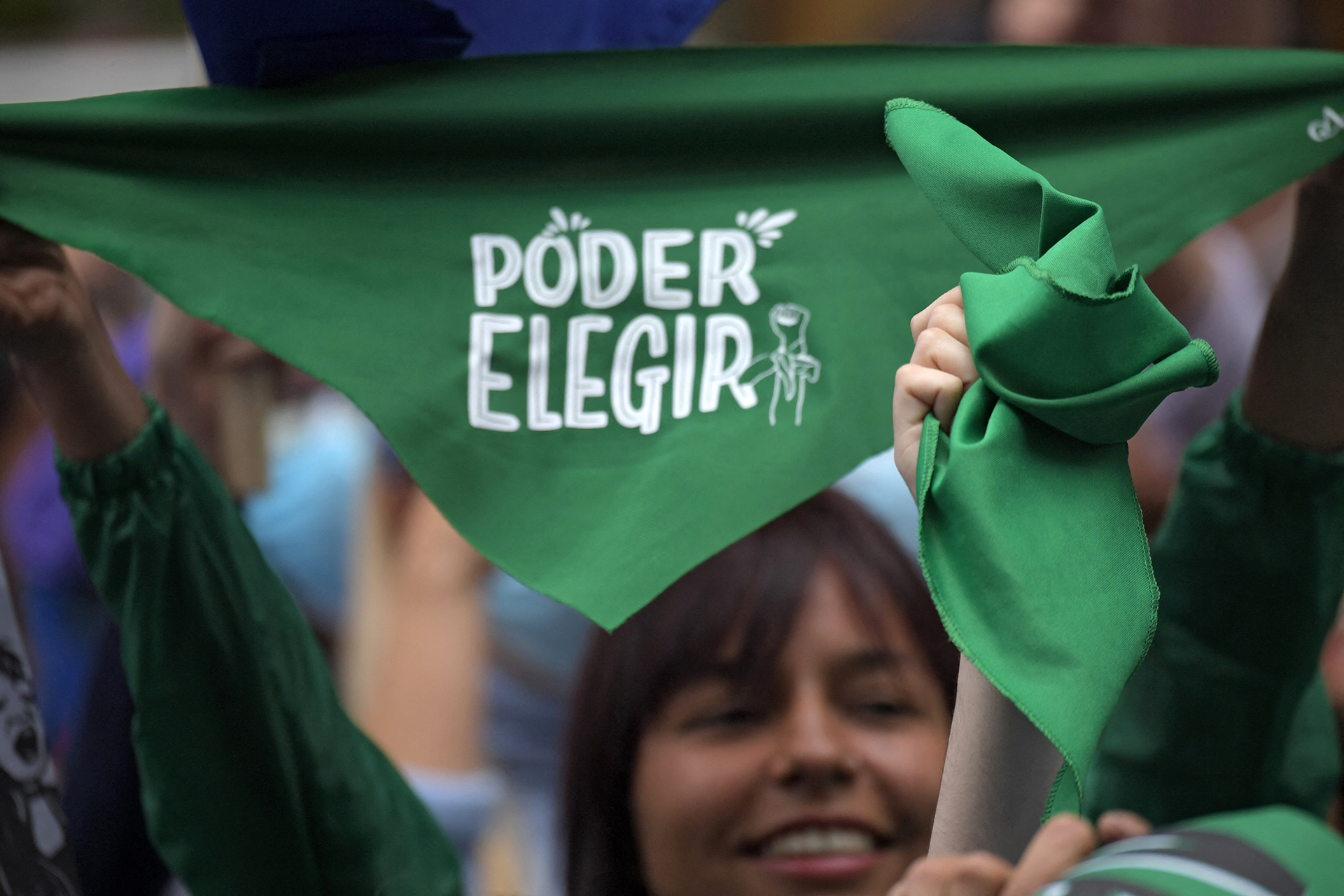 El 21 de febrero en Bogotá se realizaron marchas para festejar la despenalización del aborto con el pañuelo verde como bandera -  (Photo by Raul ARBOLEDA / AFP)