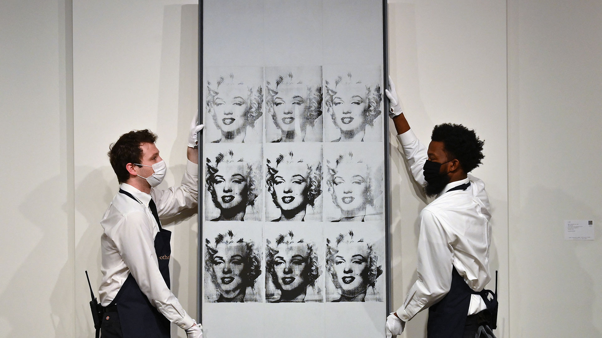 Las "Nueve Marylin" de Andy Warhol, rematada en Sotheby's el 5 de noviembre de 2021 en Nueva York.  (ANGELA WEISS / AFP)